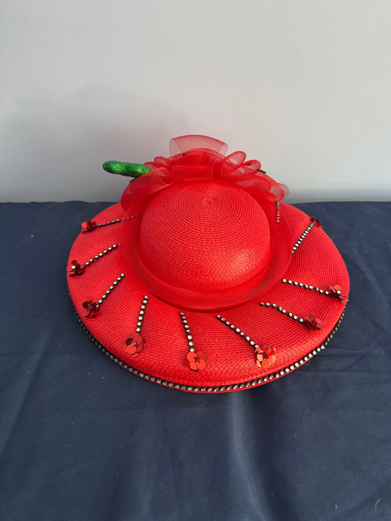 Red decorative wide-brim straw hat - image 1 of 3