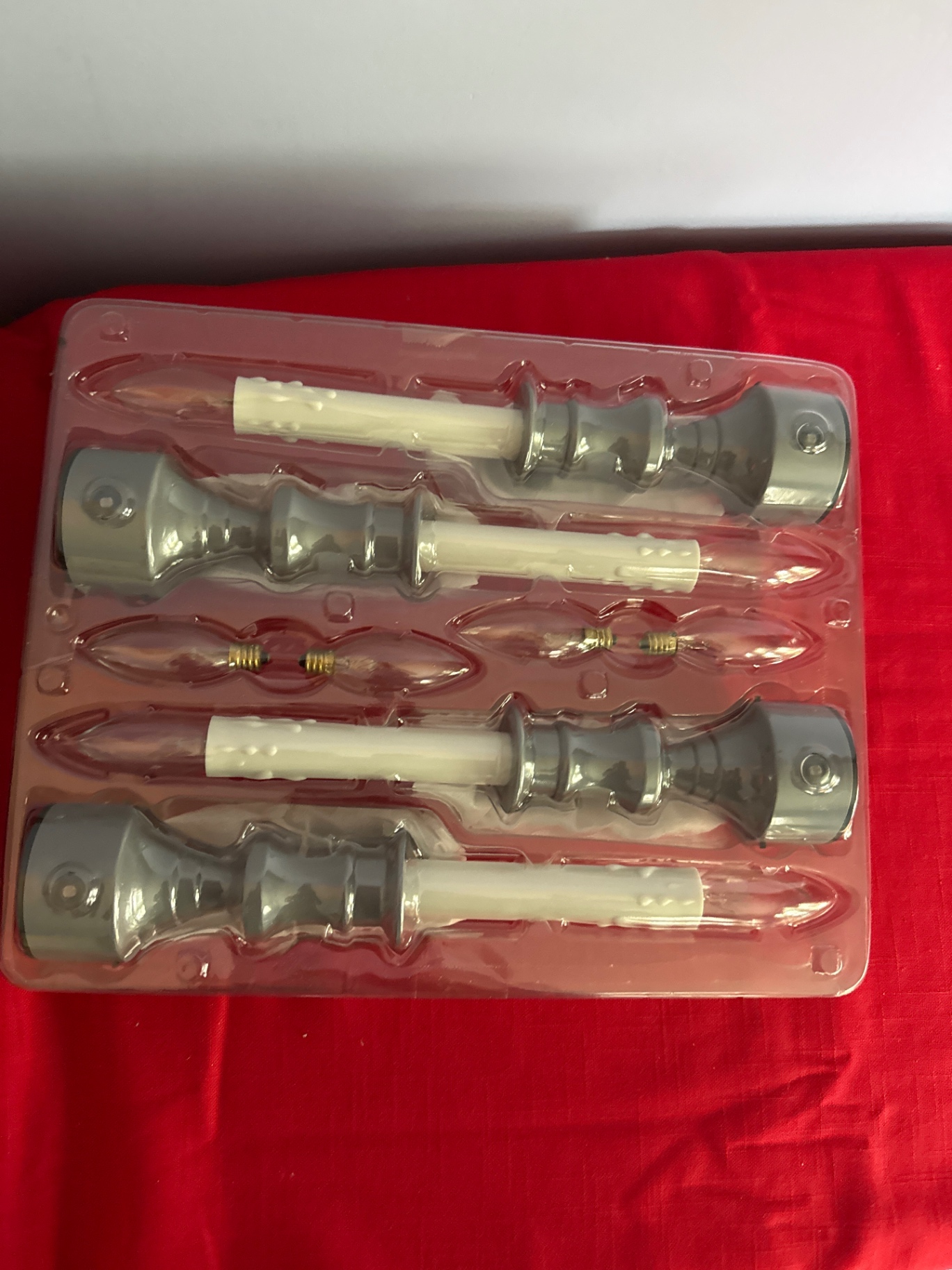 Four gray and white light socket components with bulbs - image 1 of 2