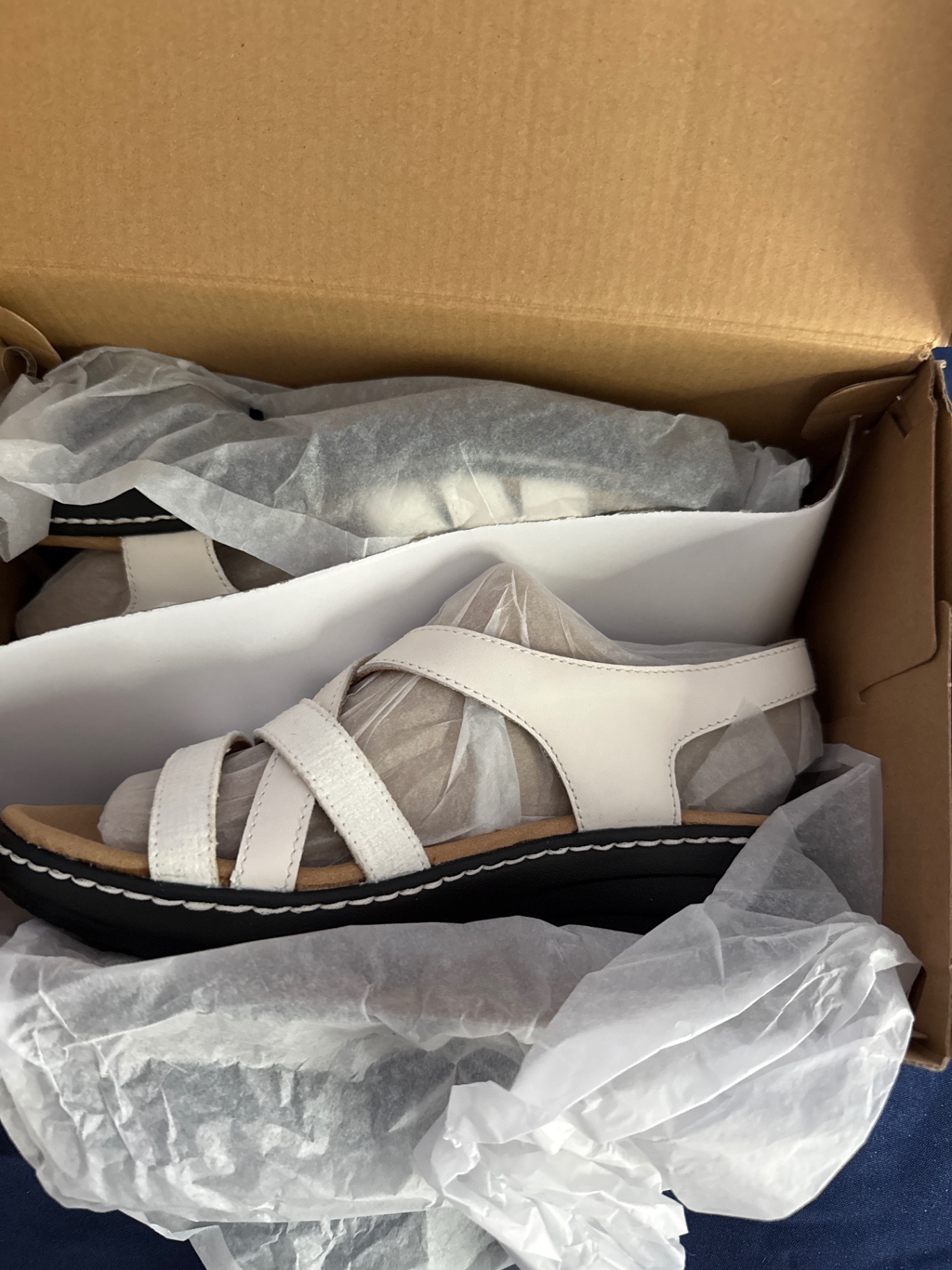 Olive-green ankle boot and white strappy sandal with Clarks Cloudsteppers boxes - image 3 of 4