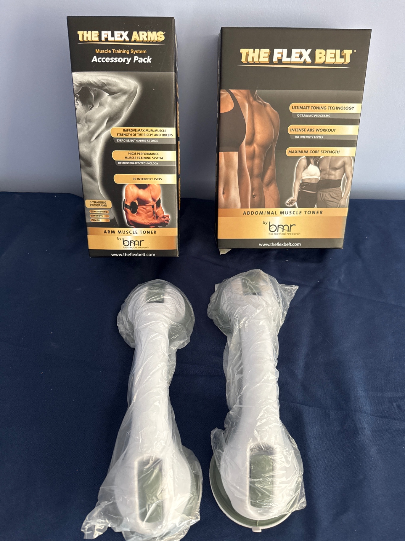The Flex Belt abdominal toner and The Flex Arms muscle toning systems with handheld devices - image 1 of 1