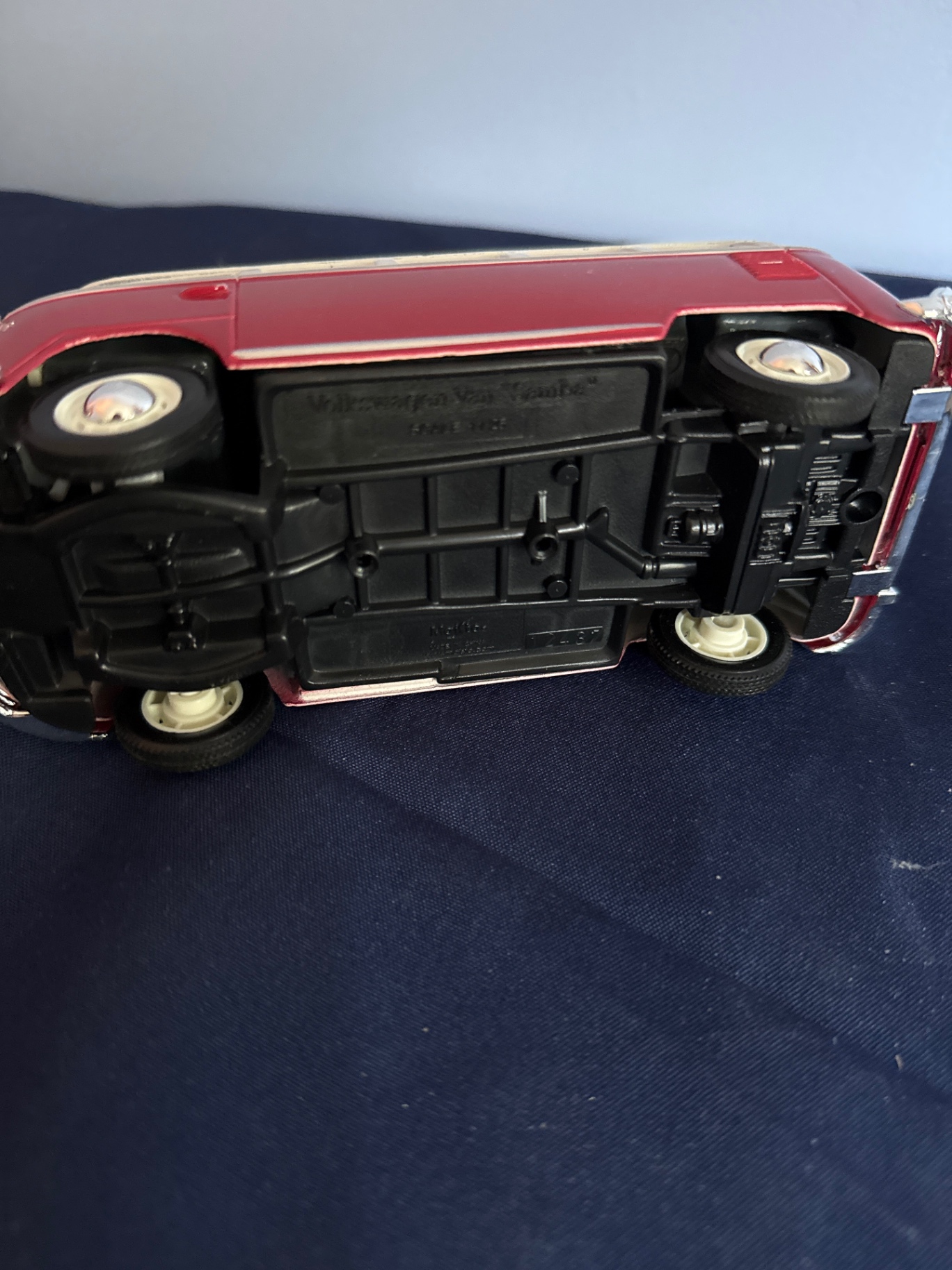 Red and white vintage die-cast toy cars: a convertible and a VW-style bus - image 5 of 5