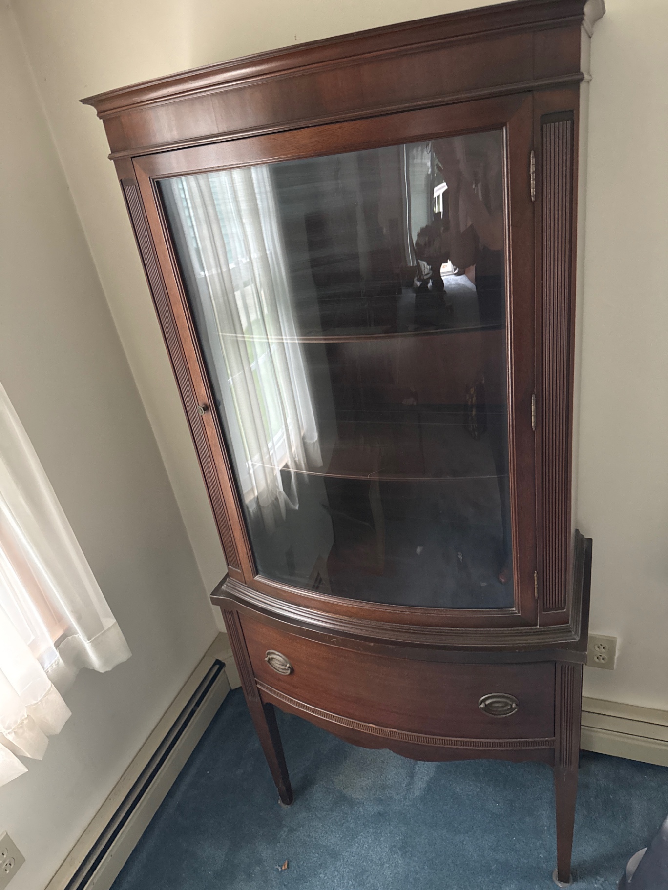 Dark wood corner display cabinet with glass doors and bottom drawer - image 2 of 3