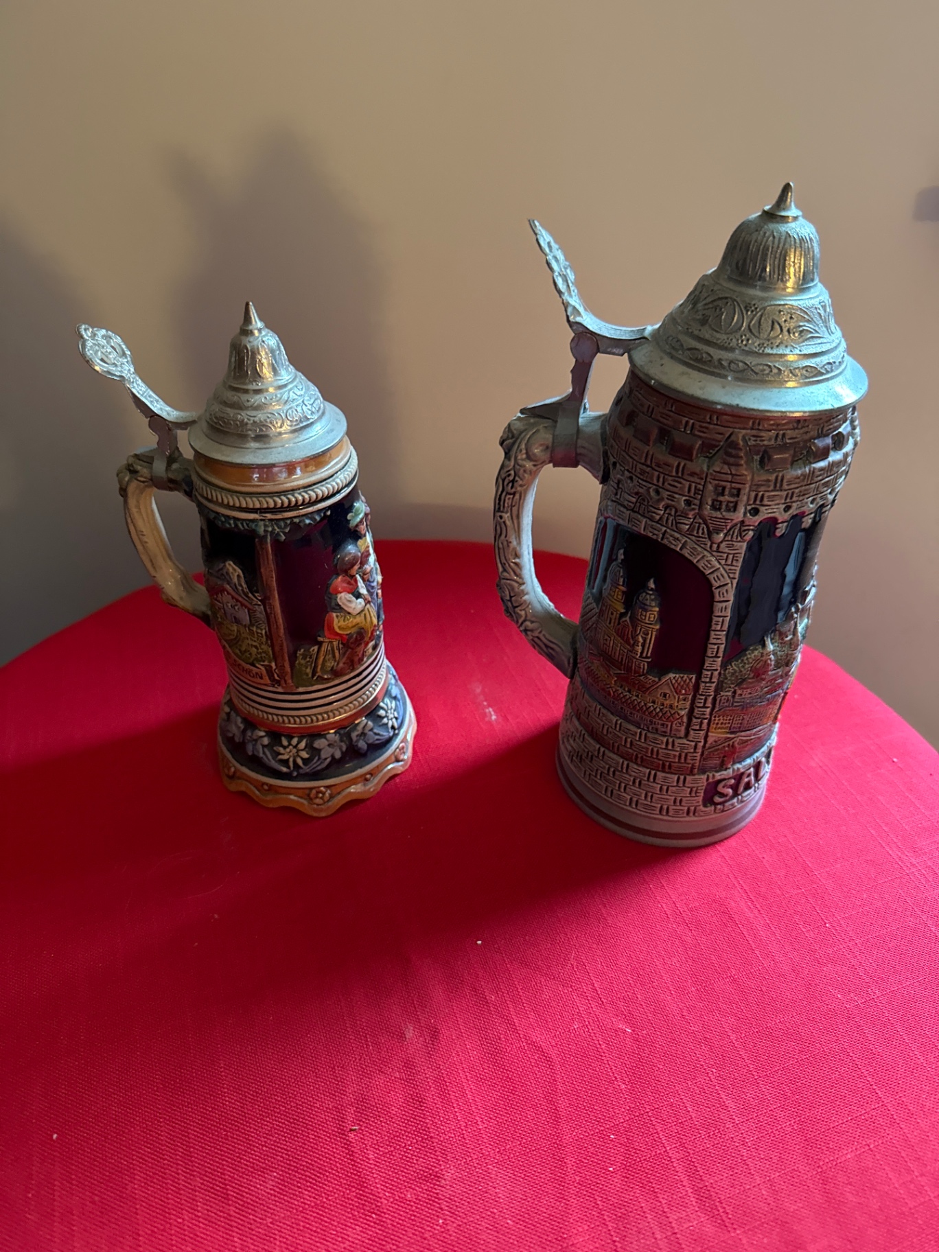 Two decorative beer steins with pewter lids - image 1 of 6