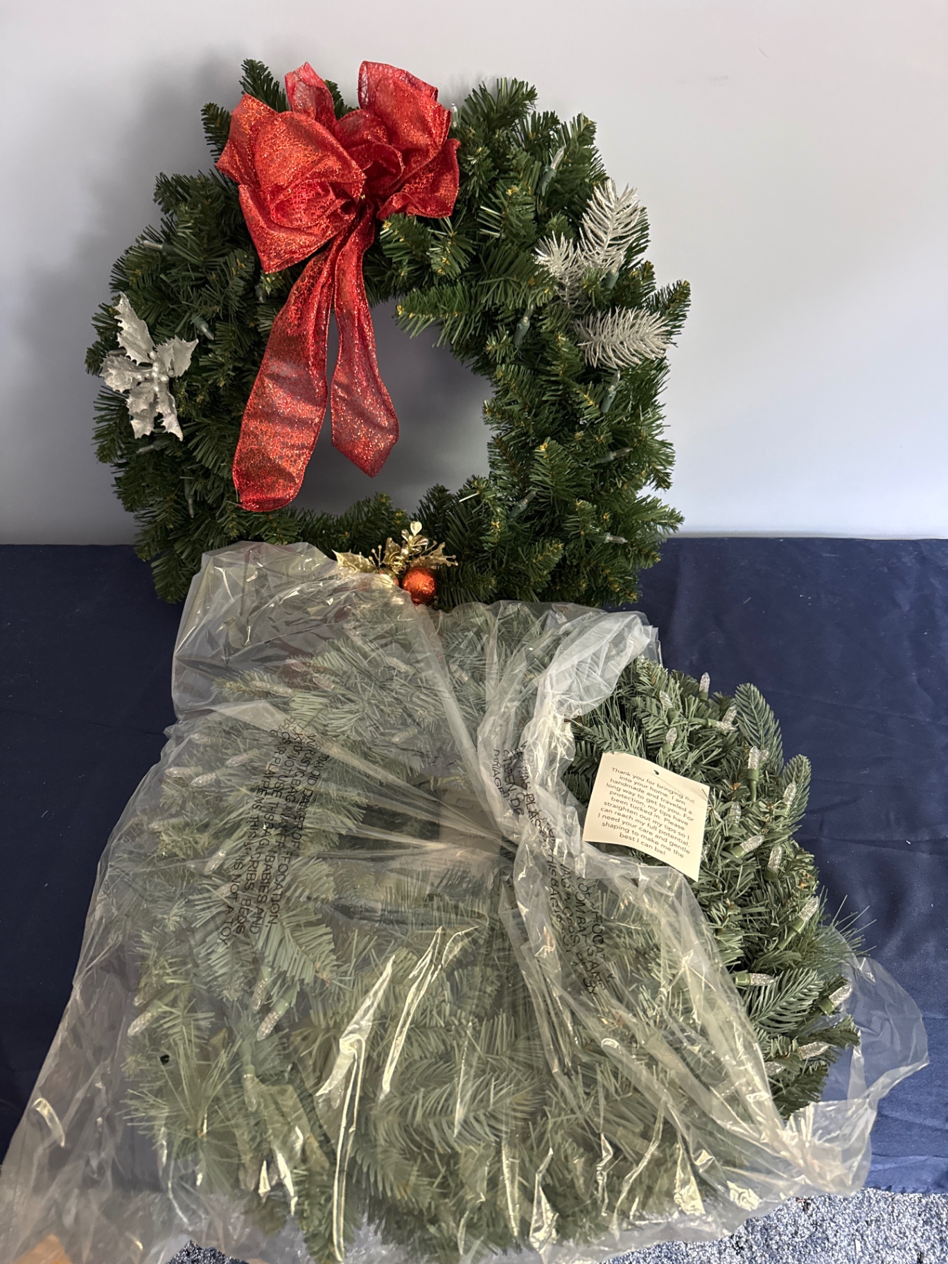 2 Christmas wreaths with red bow - image 1 of 3