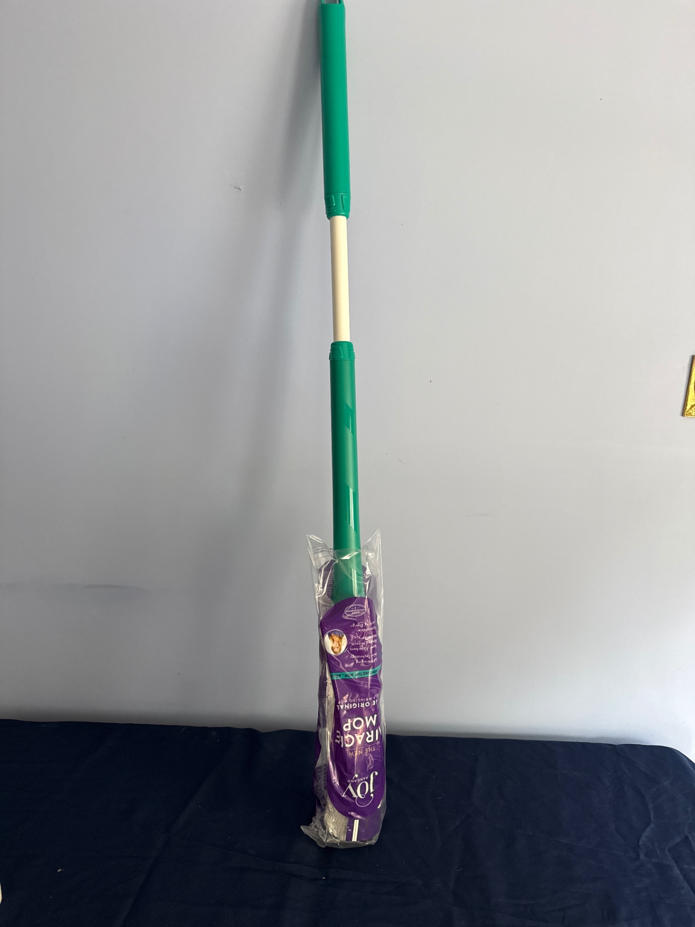 Miracle mop Green and cream mop with purple packaging - image 1 of 2