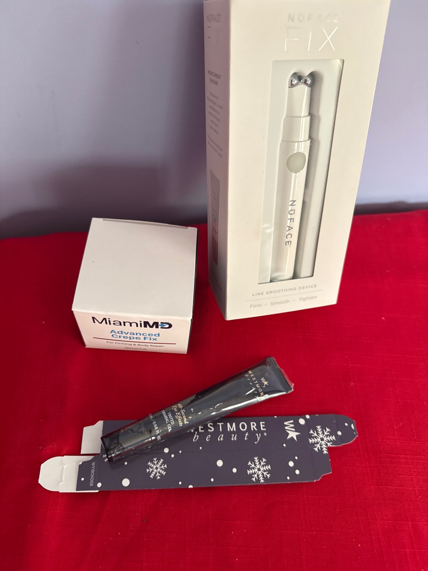NuFACE FIX facial device with skincare items - image 1 of 2