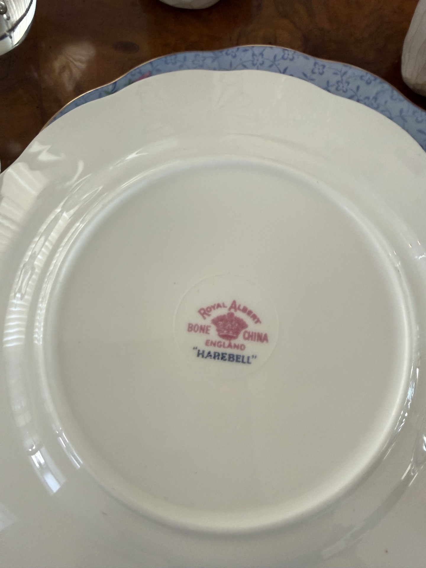 Bone china plates with crystal glassware and decorative figurines - image 3 of 6