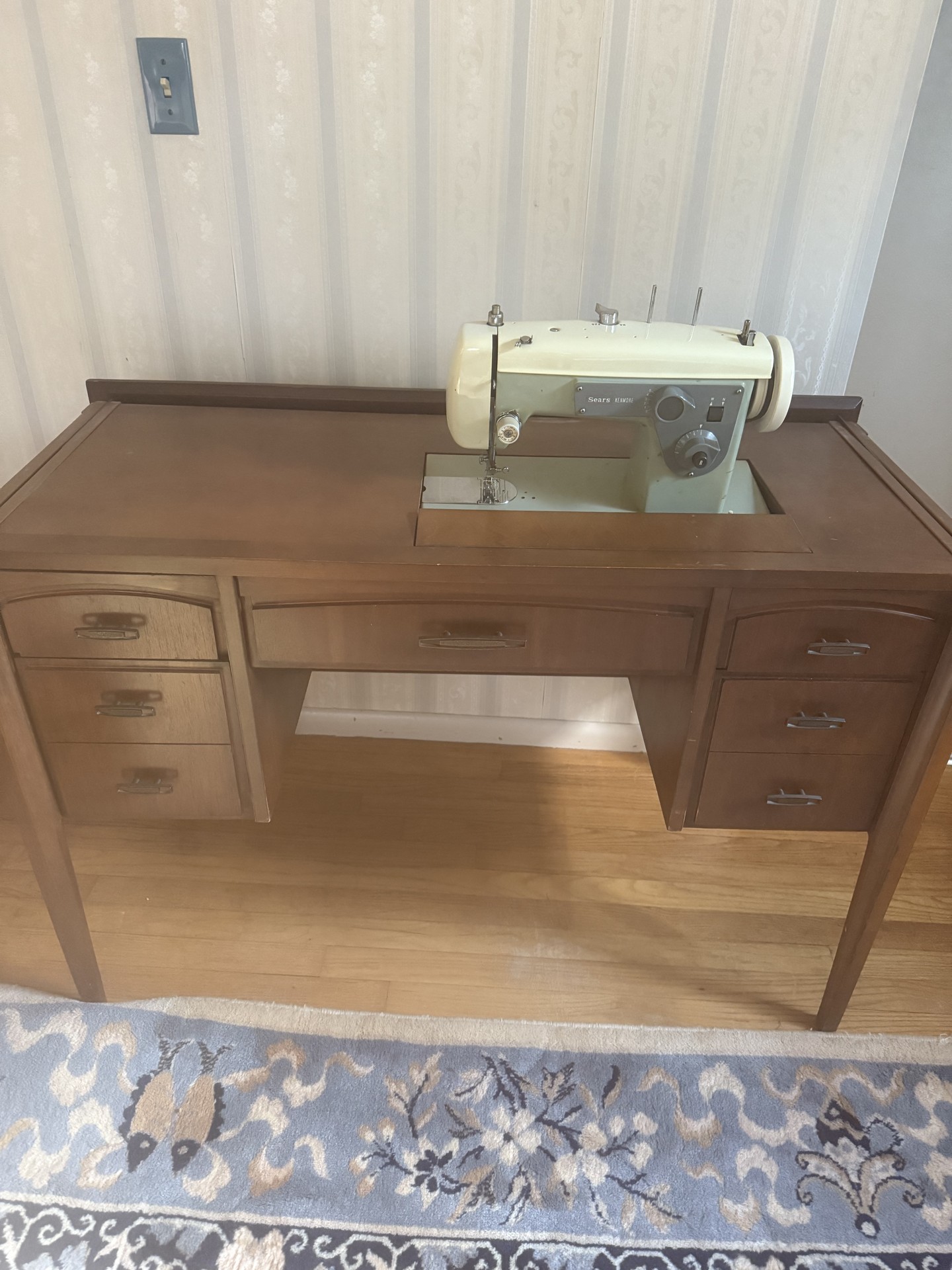 Sears Kenmore sewing machine integrated in wooden desk cabinet - image 1 of 8