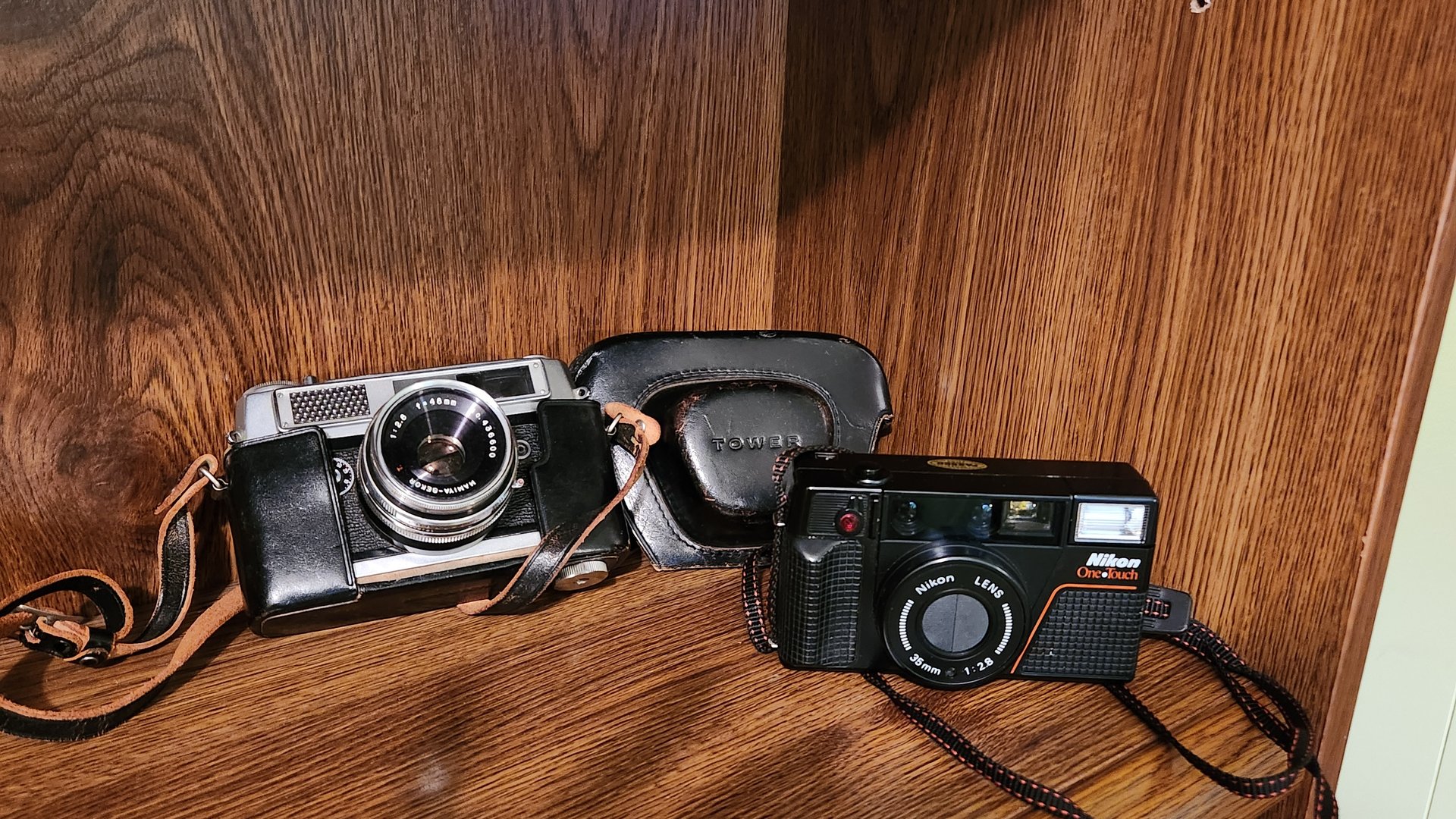 Two vintage cameras with cases  - image 1 of 3