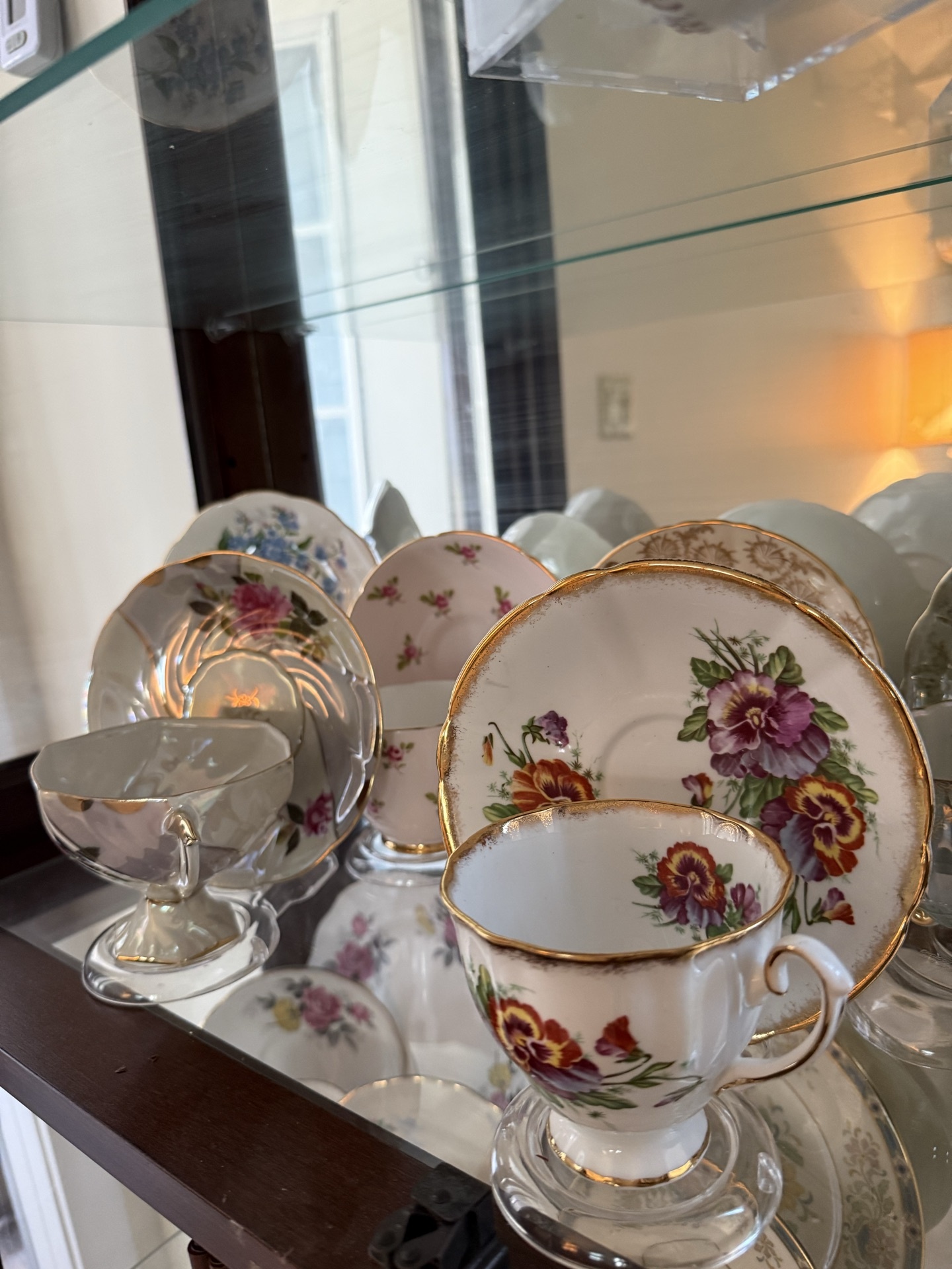 Set of floral bone china tea dishes and cups - image 1 of 12