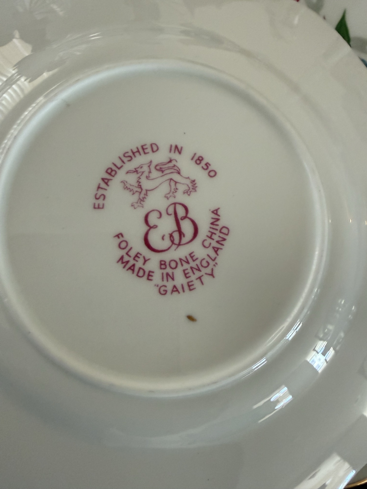 Bone china plates with crystal glassware and decorative figurines - image 5 of 6