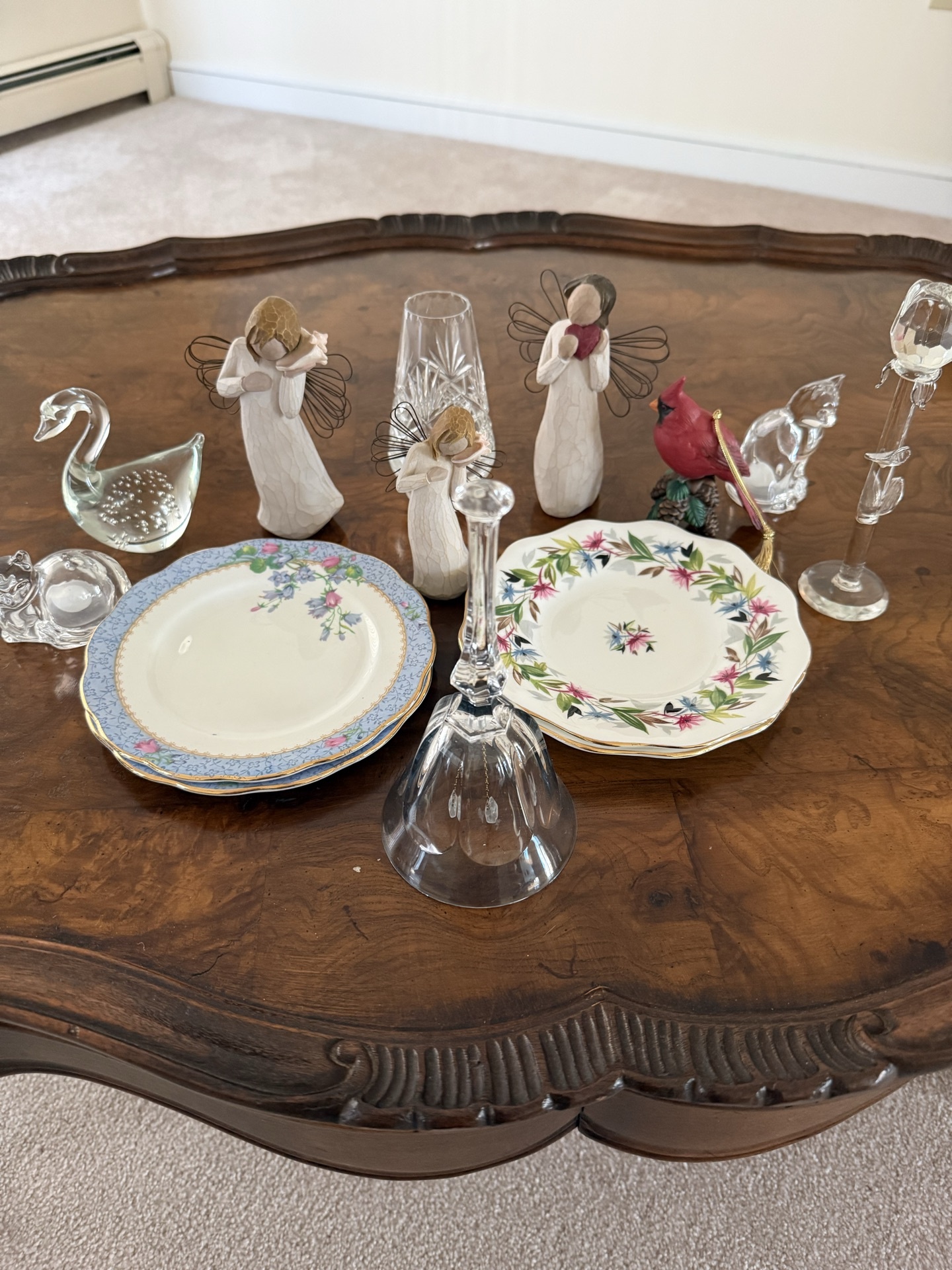 Bone china plates with crystal glassware and decorative figurines - image 1 of 6