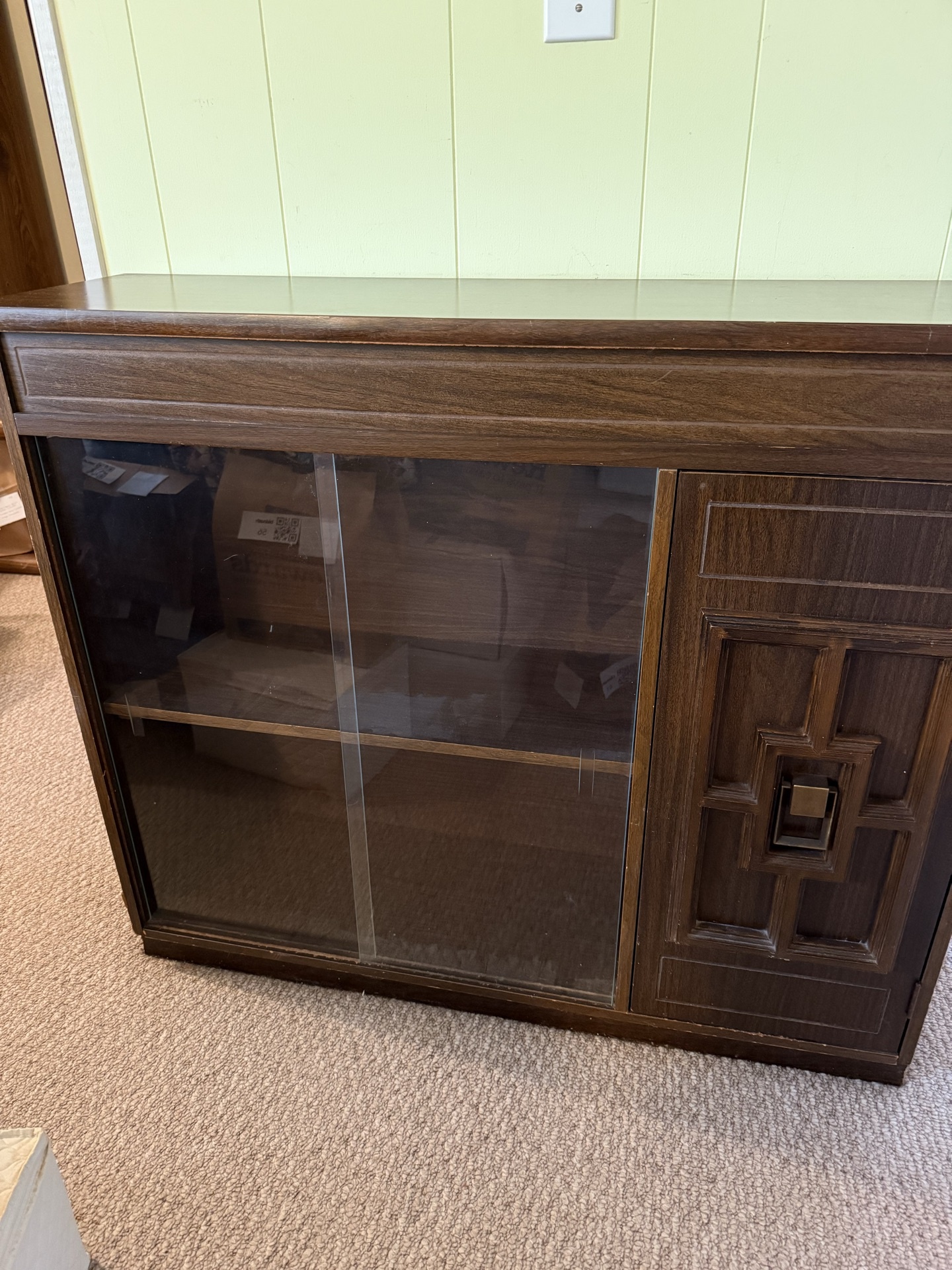 Dark wood TV stand with glass doors - image 1 of 6