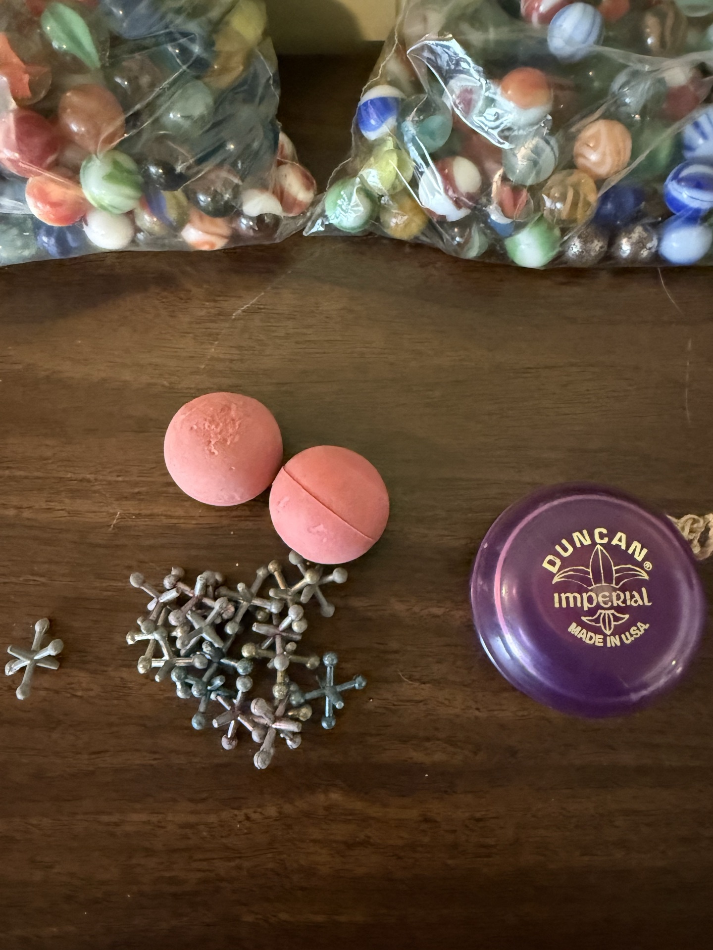 Assorted marbles and a Duncan Imperial yo-yo - image 2 of 6