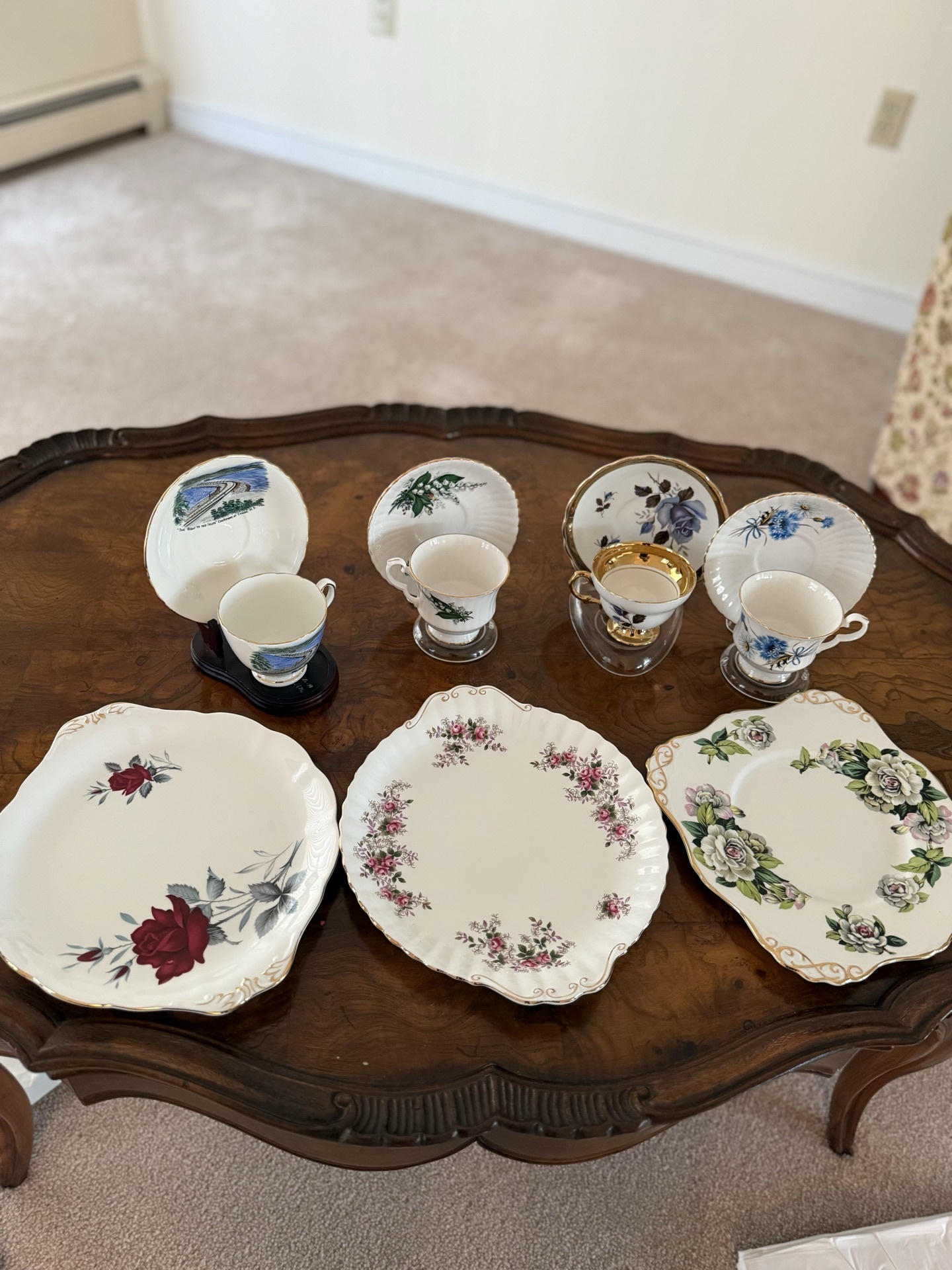 Floral porcelain tea set with plates and cups - image 1 of 10
