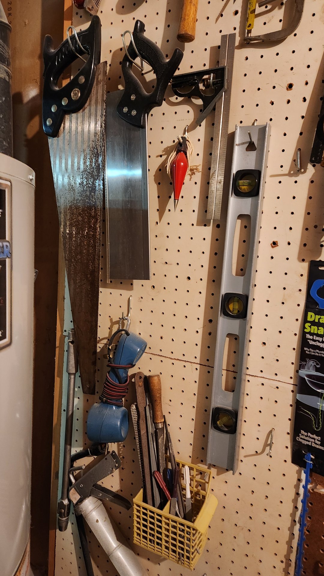 Pegboard workshop with tools and hardware - image 3 of 9