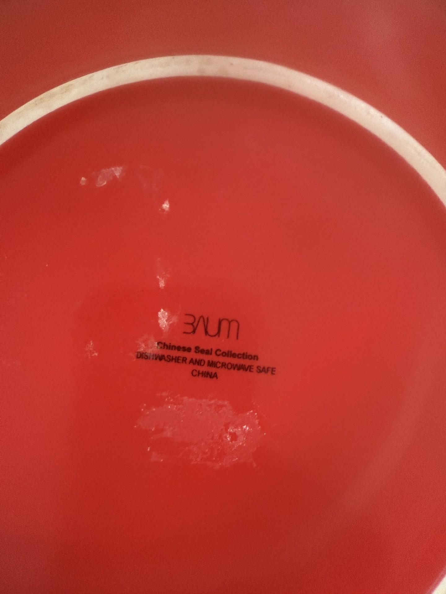 Red leaf-shaped plate with Chinese calligraphy - image 2 of 4