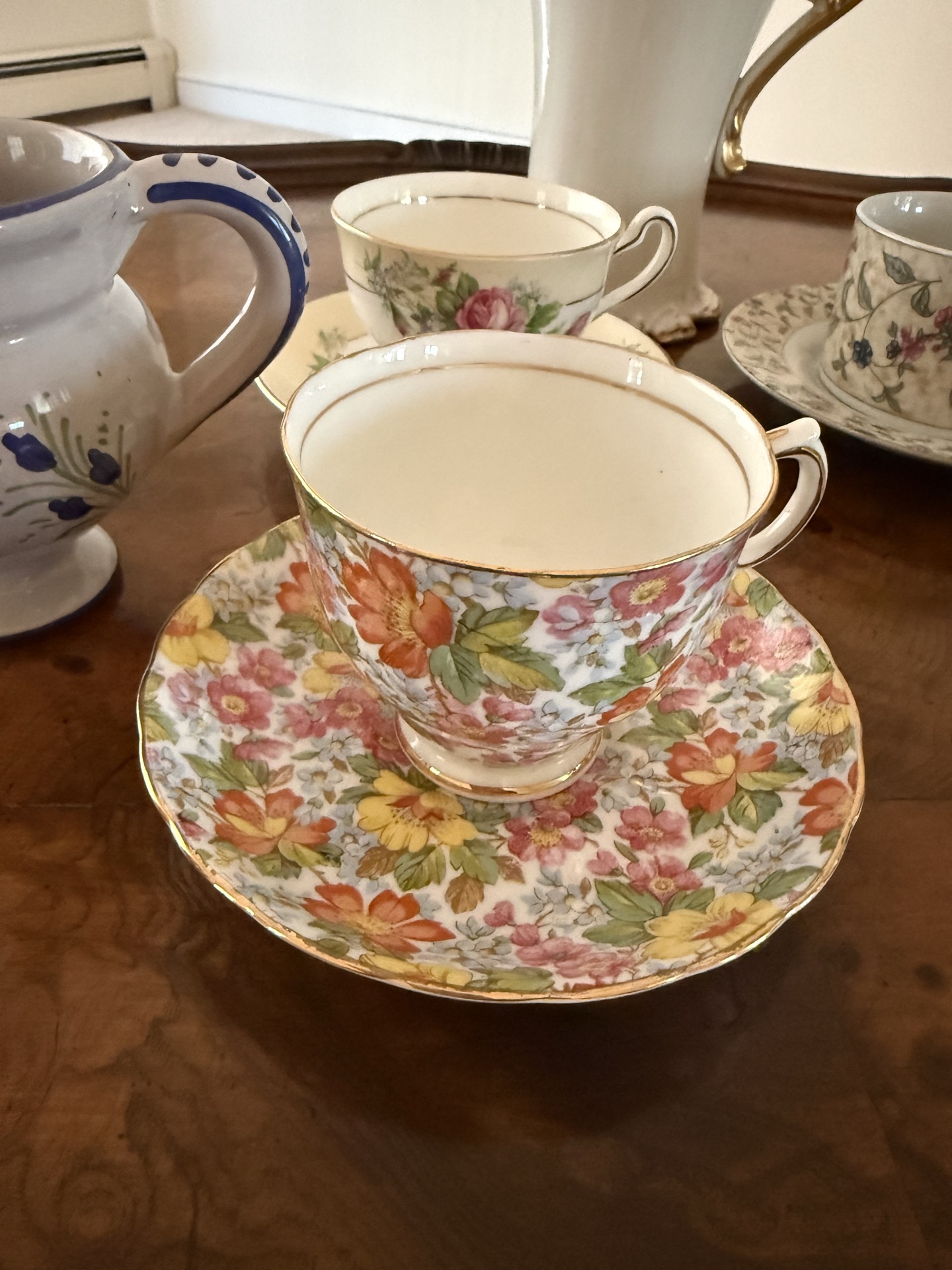 Floral porcelain tea set with teapot, creamer, and cups - image 2 of 10