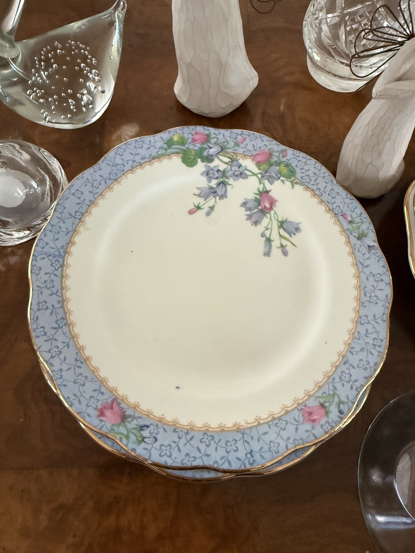 Bone china plates with crystal glassware and decorative figurines - image 2 of 6