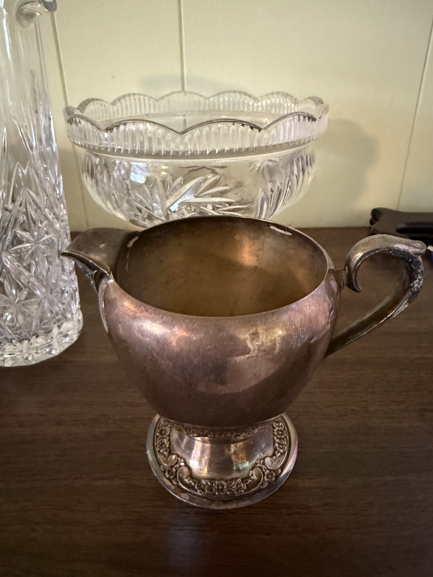 Vintage kitchenware collection including silver-plated creamer, crystal glassware, strainers and wire dish rack - image 2 of 7