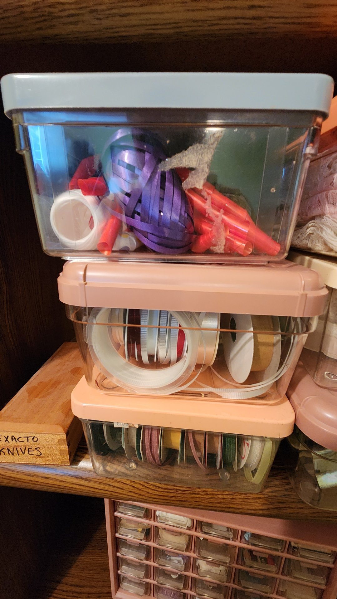 Craft supplies organized in labeled containers and drawers - image 3 of 11