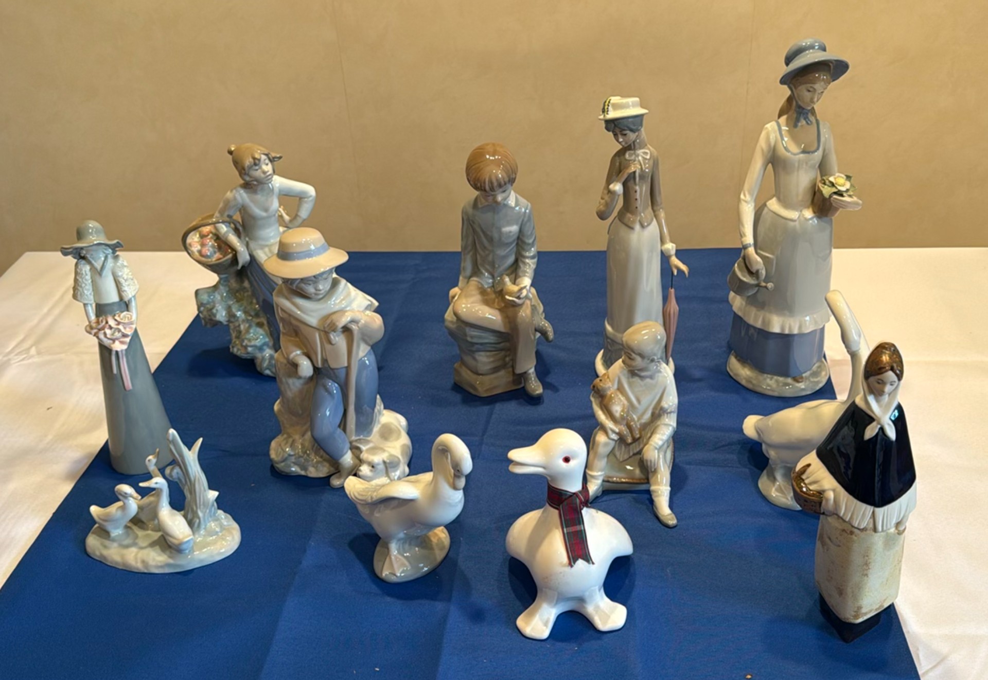 Assorted Porcelain Figurines of People and Animals - image 1 of 4