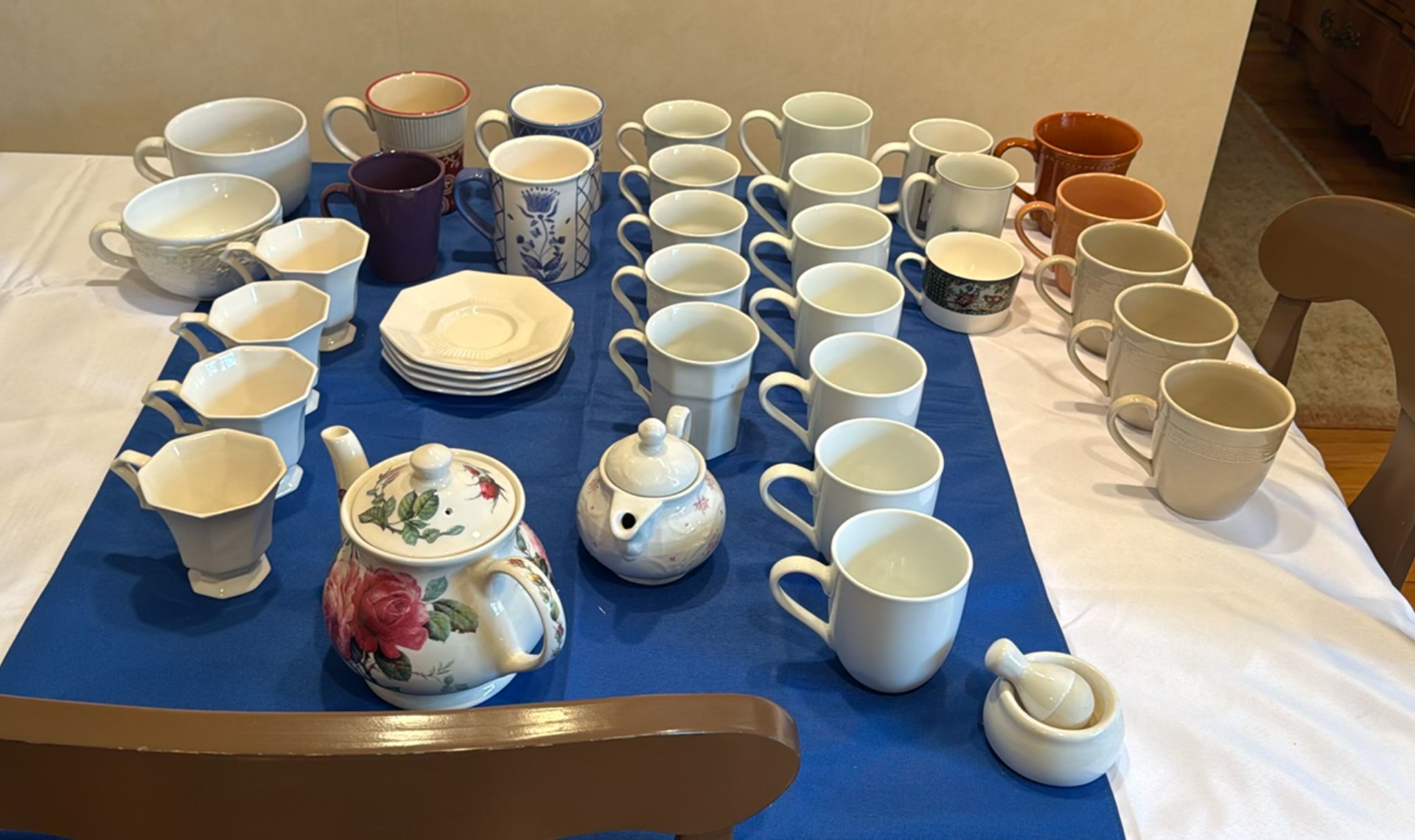 Assorted Ceramic Mugs, Teapots, and Saucers - image 1 of 7