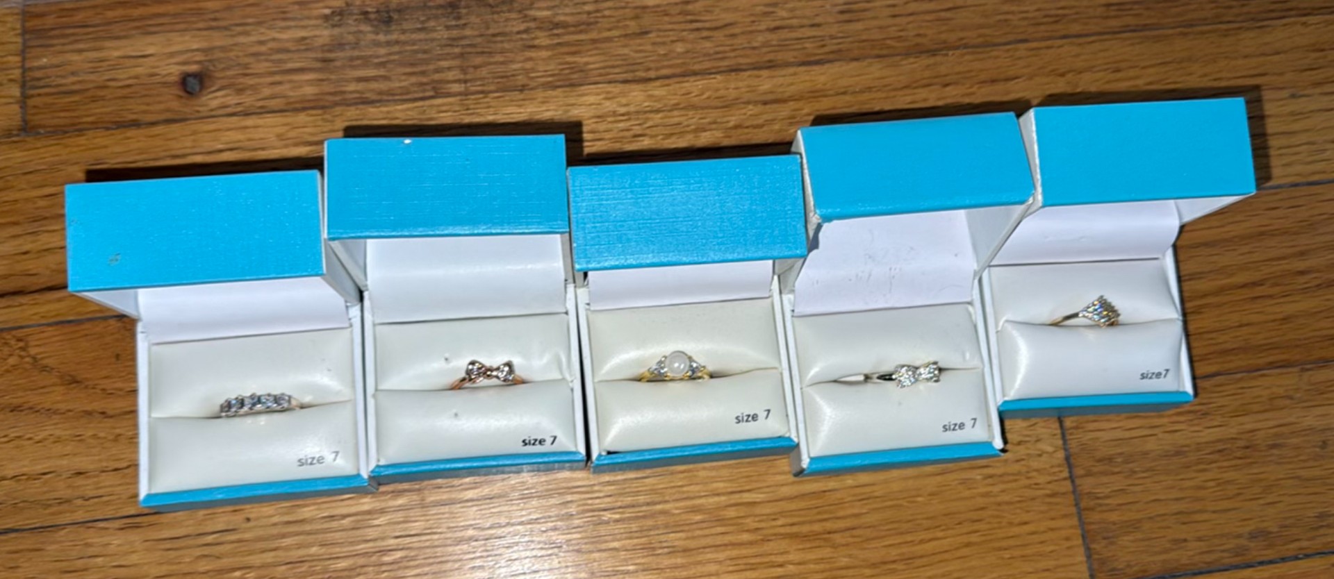 Five Rings in Blue Jewelry Boxes - image 1 of 3