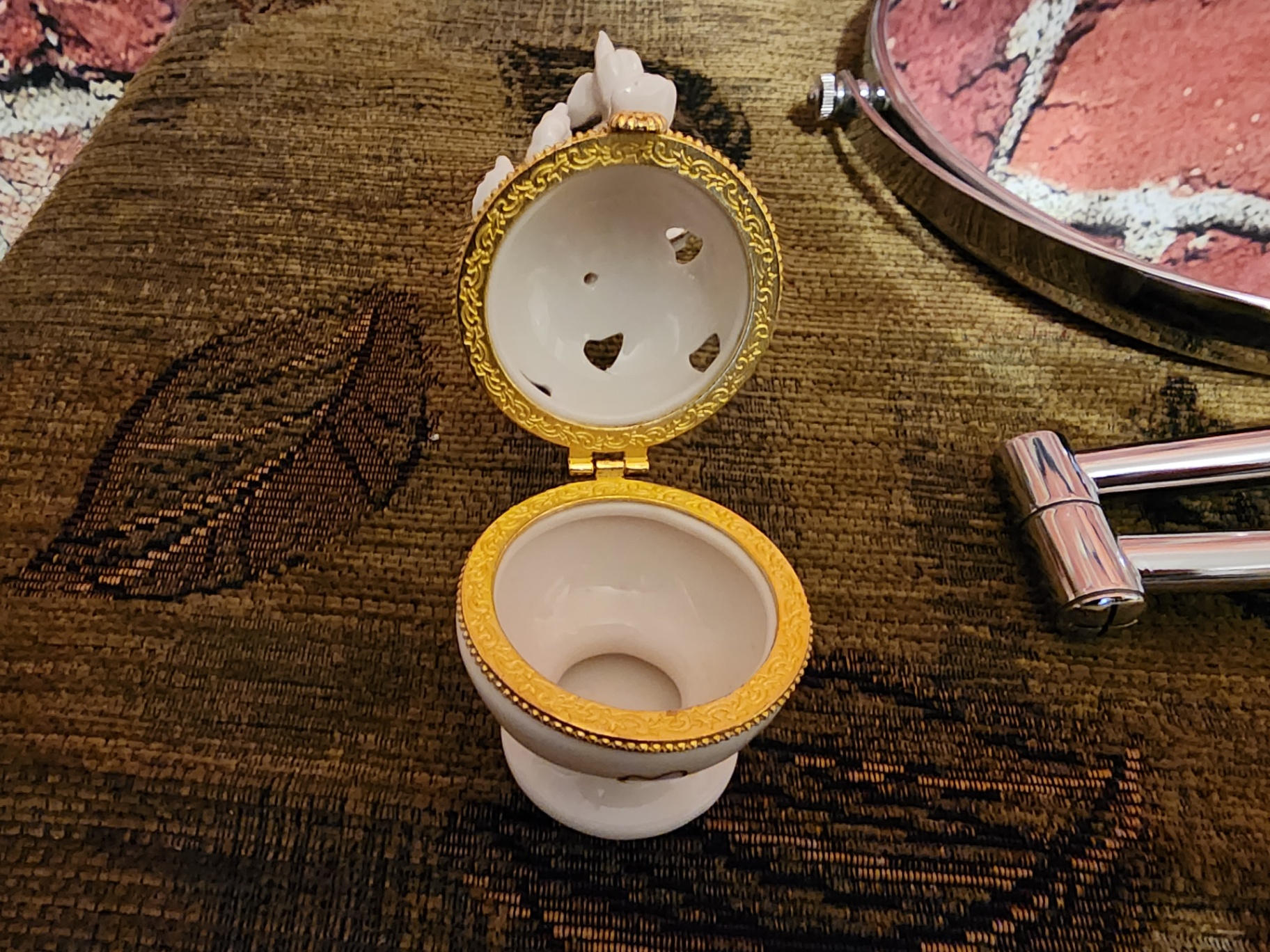 Round vanity mirror with porcelain angel figurine and decorative containers - image 5 of 8
