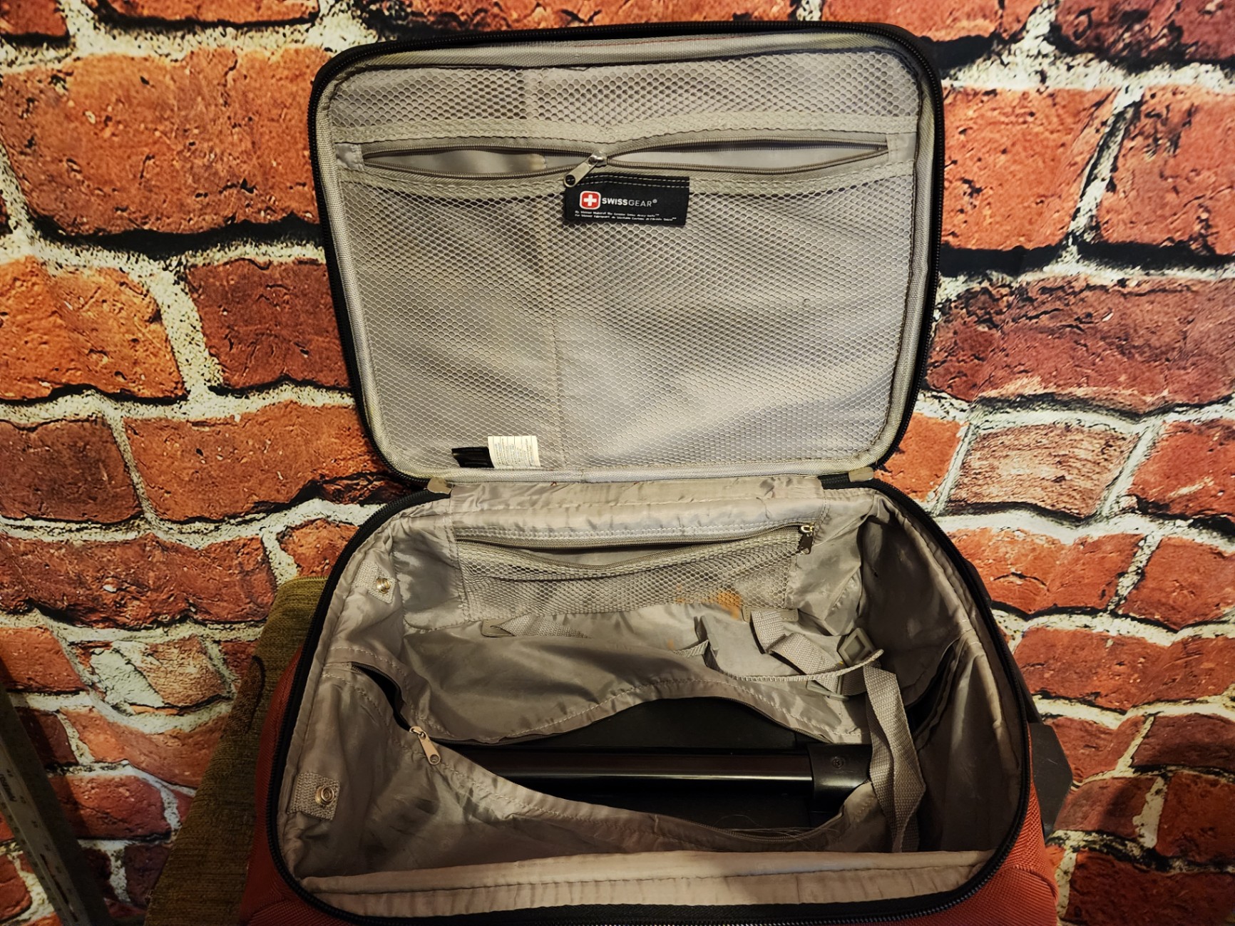Black wheeled base, gray SwissGear red rolling suitcase - image 9 of 10