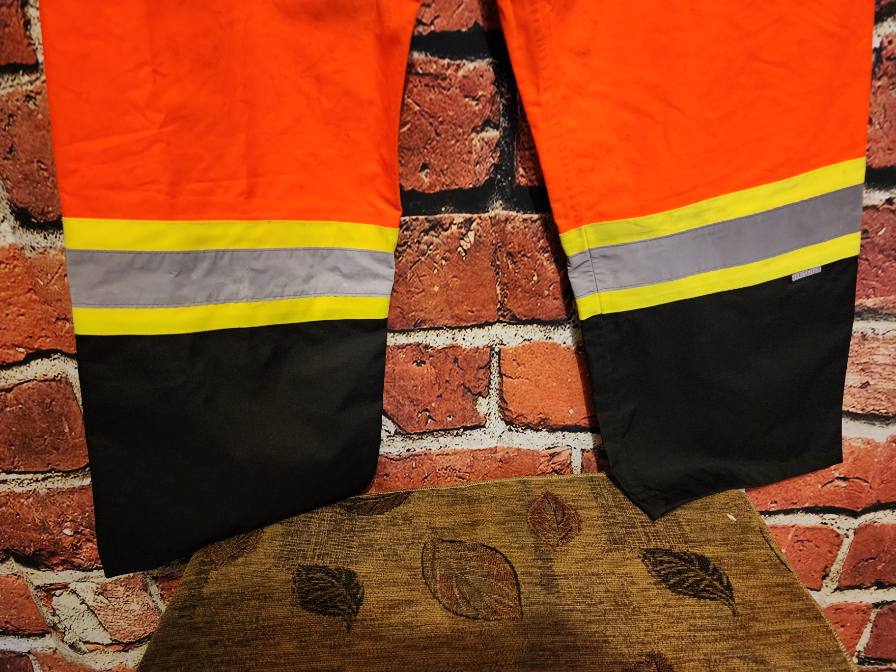 Orange high-visibility safety pants with reflective bands - image 7 of 9