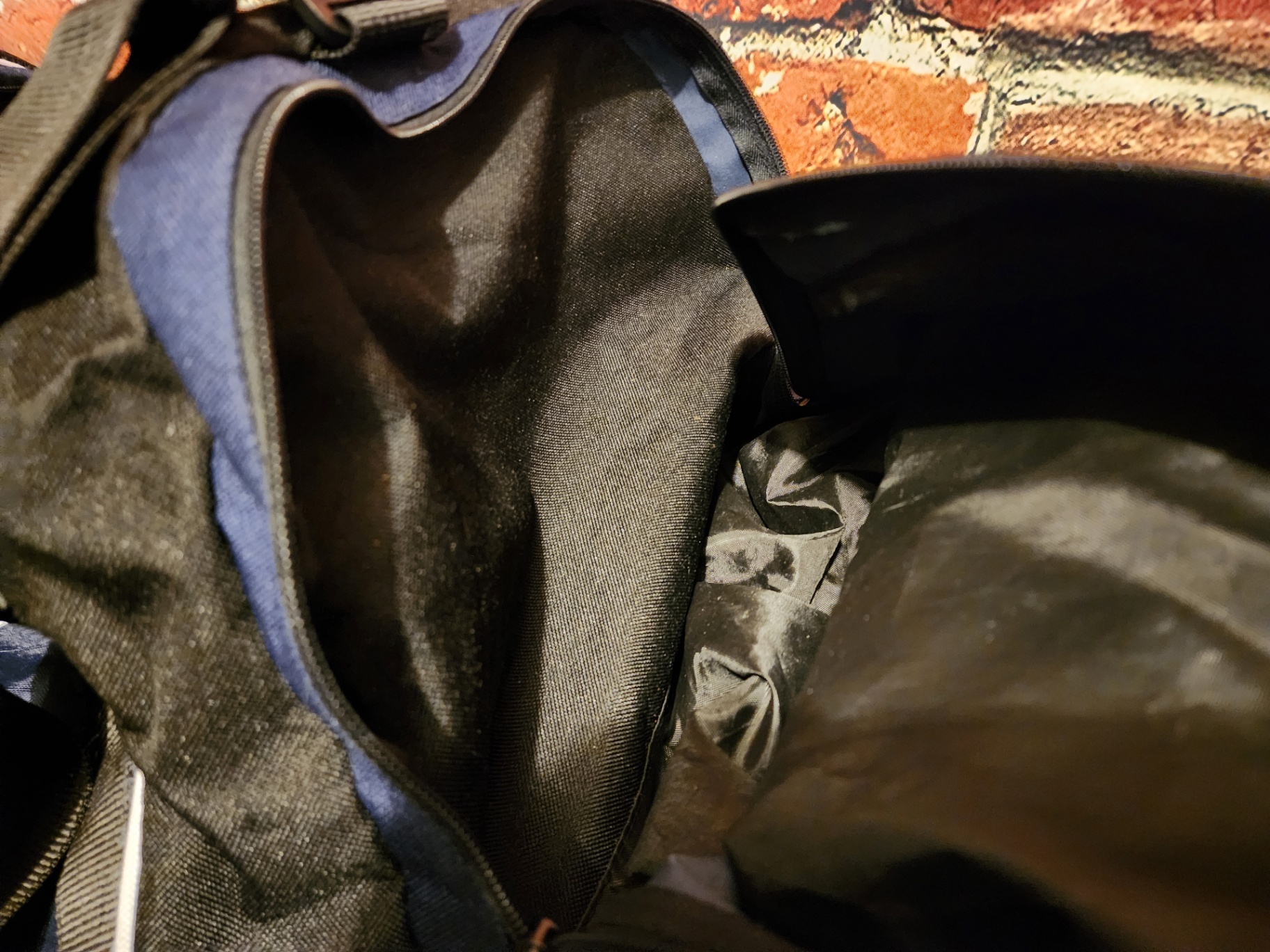 Blue Umbro duffel bag and black wheeled gear case - image 10 of 11