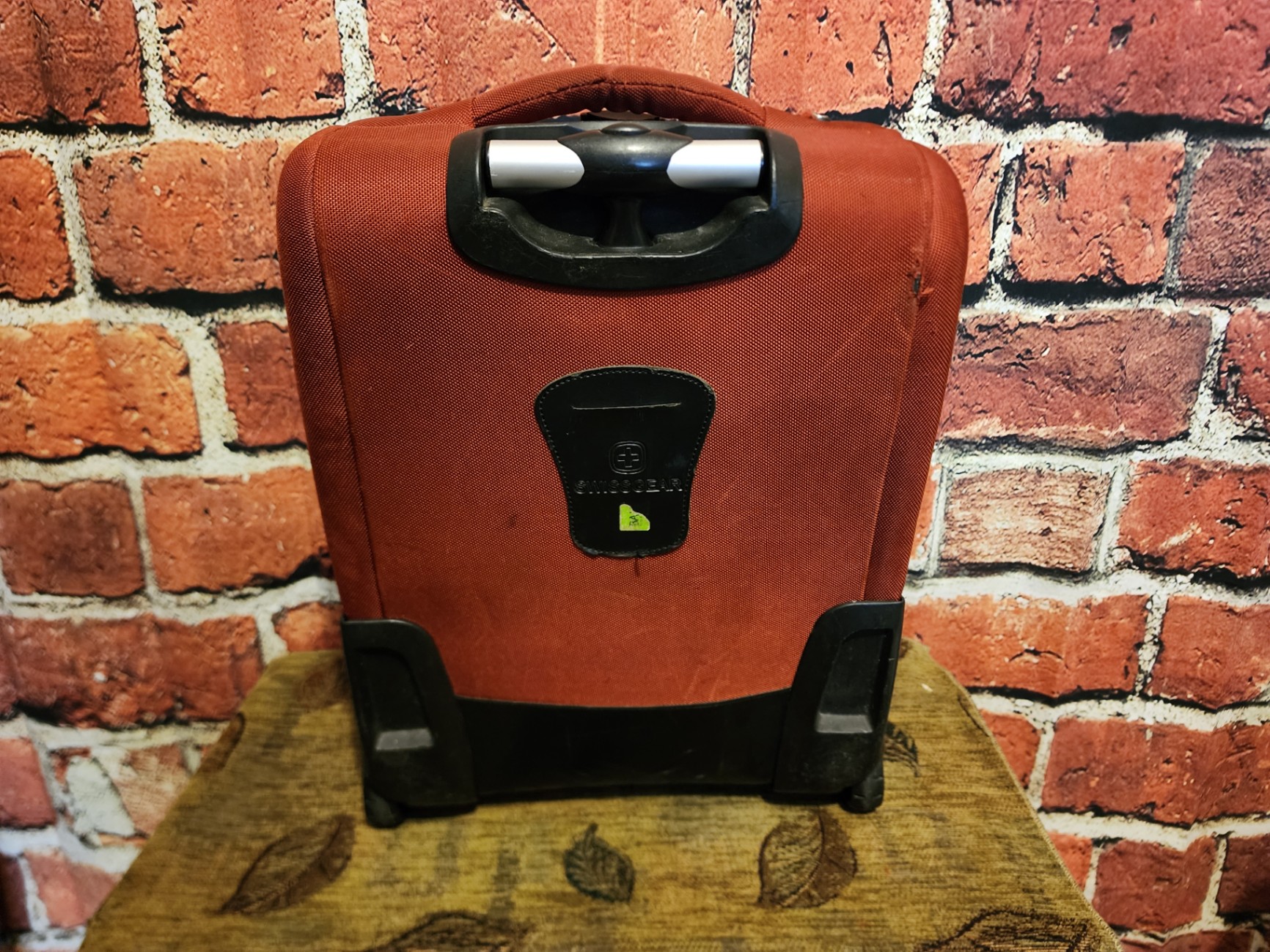 Black wheeled base, gray SwissGear red rolling suitcase - image 6 of 10
