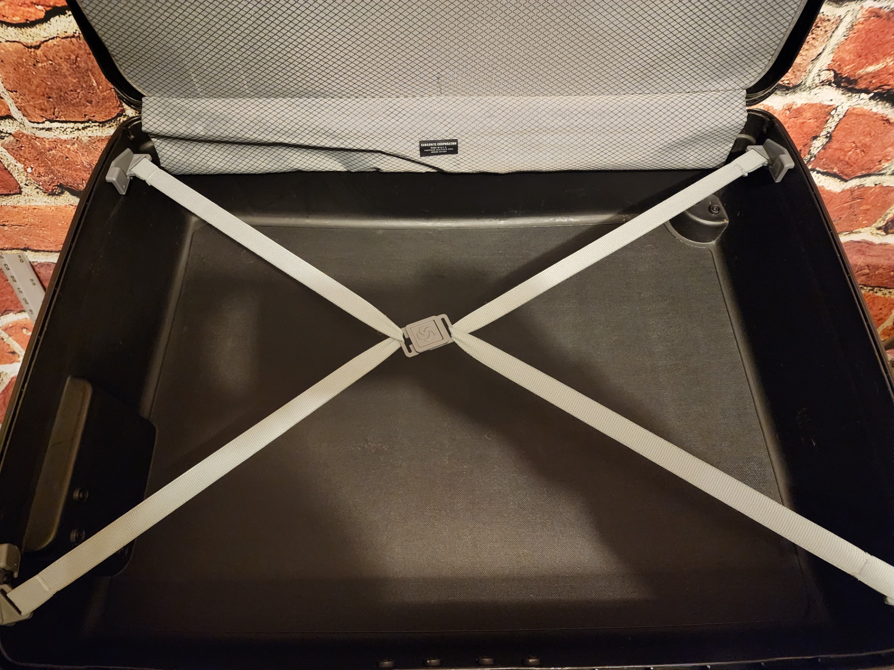 Black Samsonite hard-shell wheeled suitcase - image 9 of 11