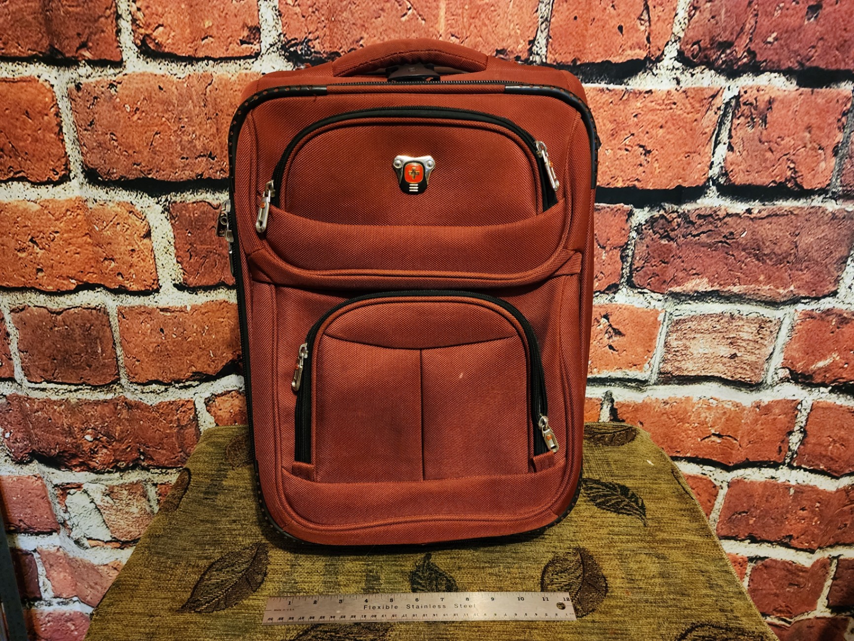 Black wheeled base, gray SwissGear red rolling suitcase - image 5 of 10