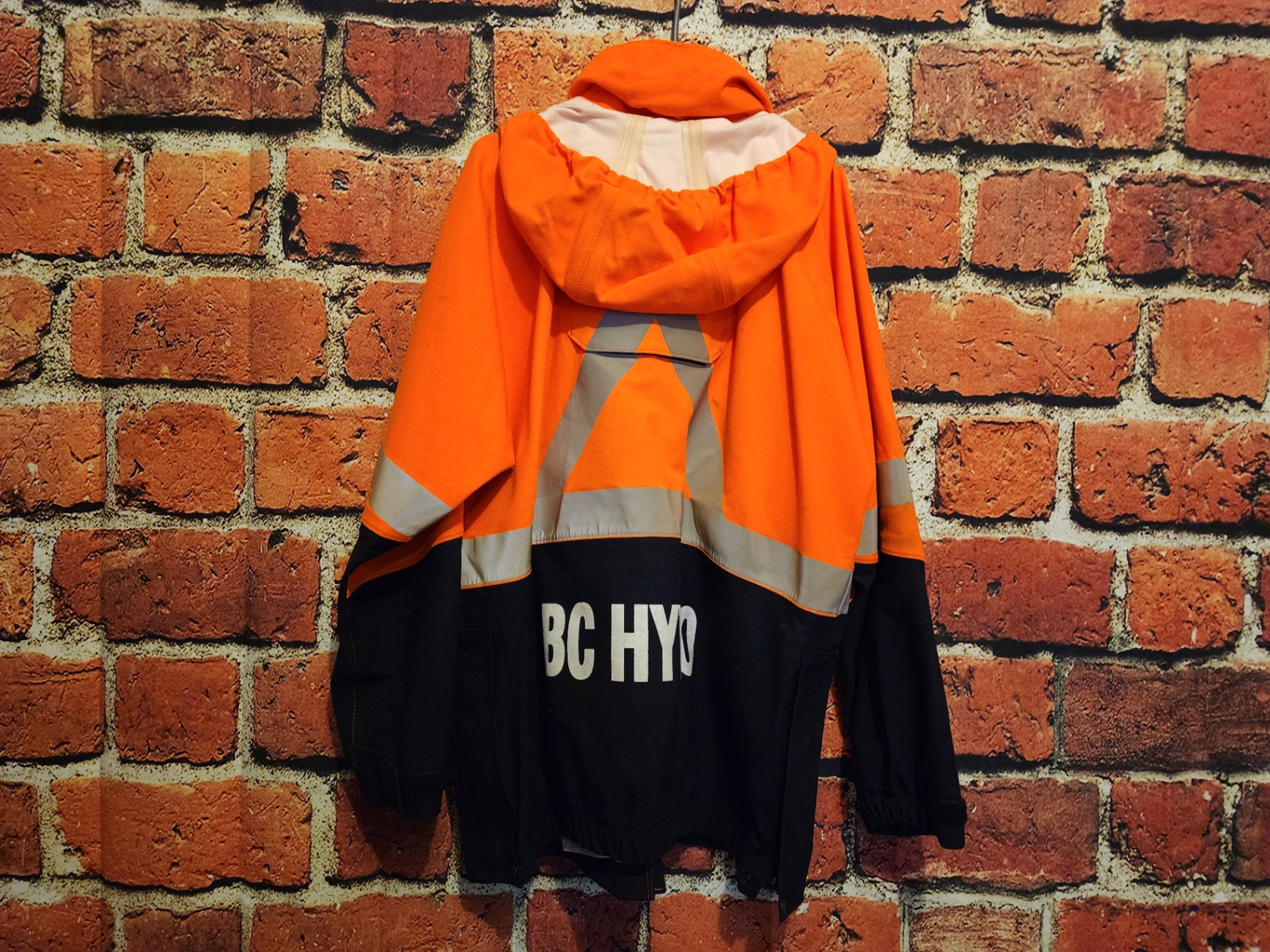 Orange high-visibility safety jacket with reflective stripes - image 3 of 9