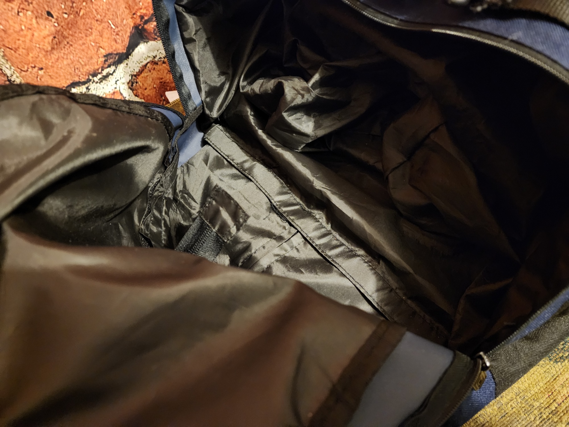 Blue Umbro duffel bag and black wheeled gear case - image 4 of 11