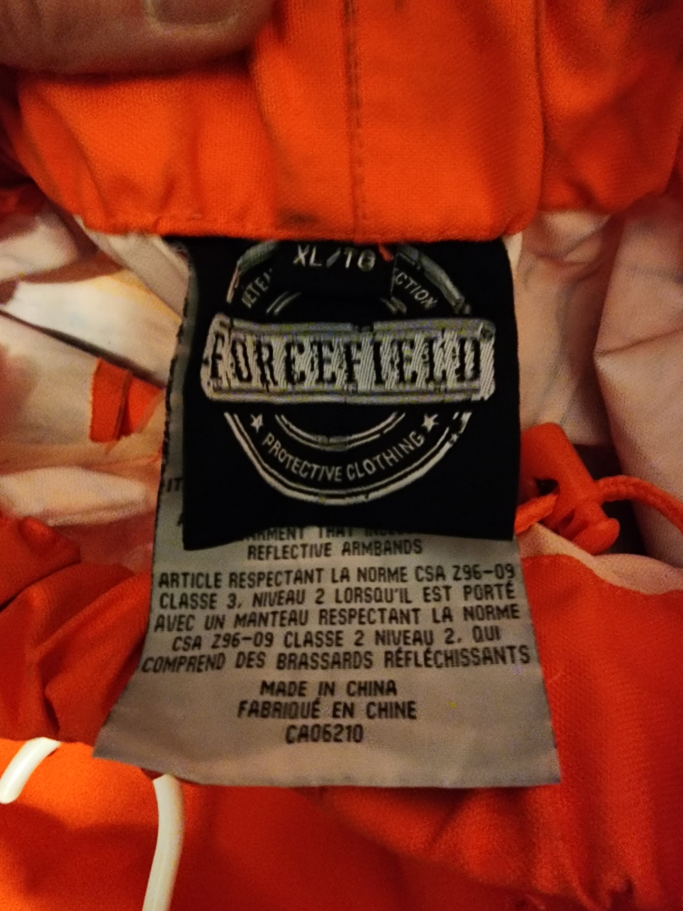 Orange high-visibility safety pants with reflective bands - image 5 of 9