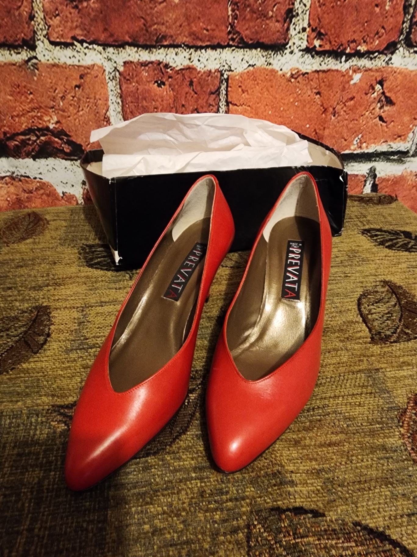 Pair of red high-heeled pumps - image 1 of 7