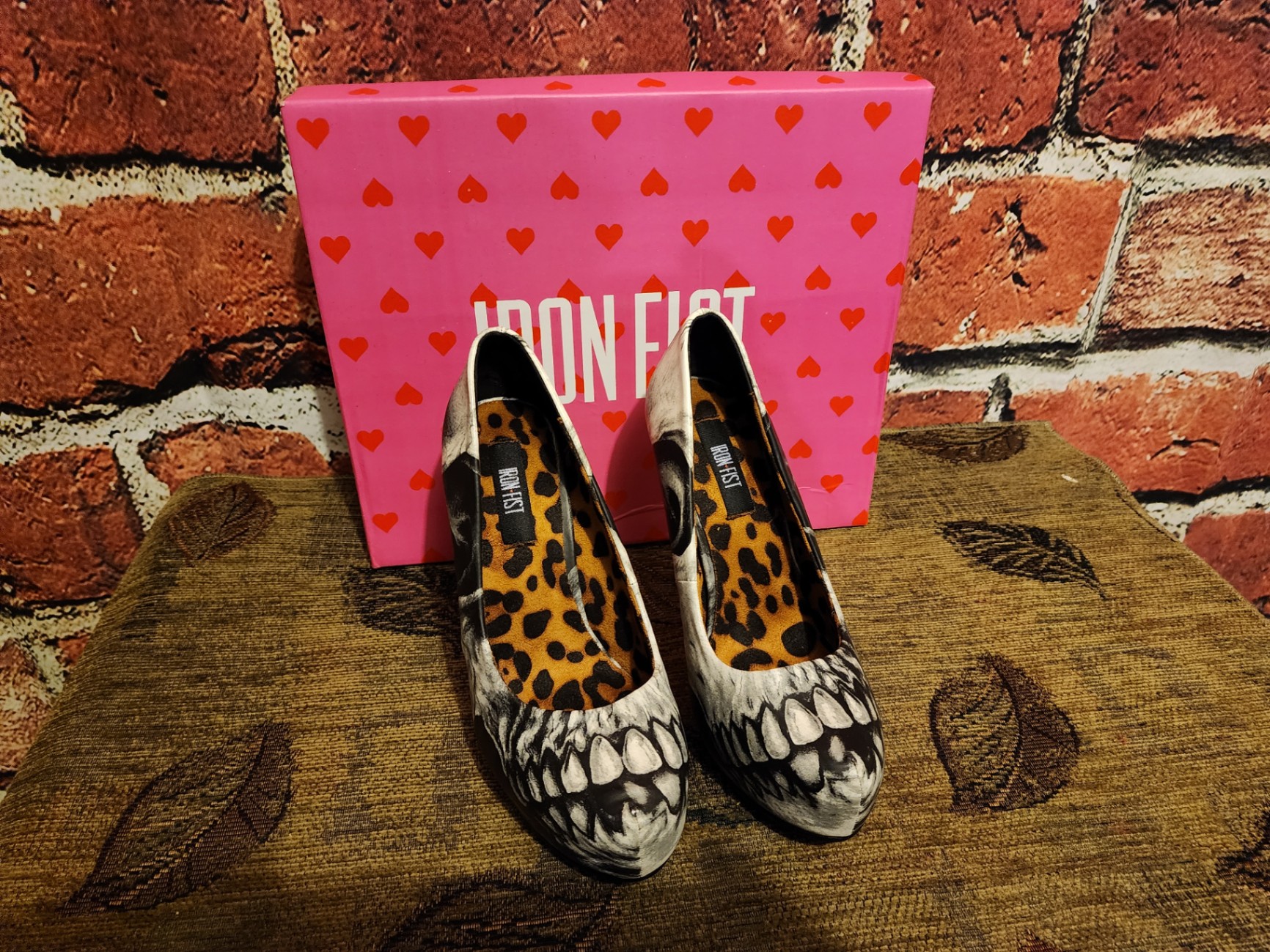 Two pairs of skull-patterned high-heeled shoes with leopard lining - image 1 of 7