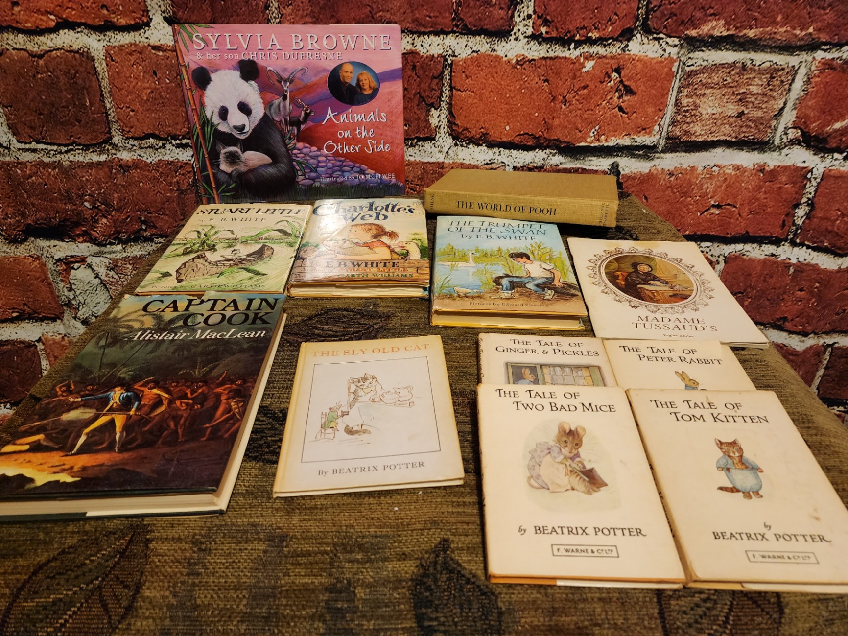 Assorted Beatrix Potter titles and classic books - image 1 of 9