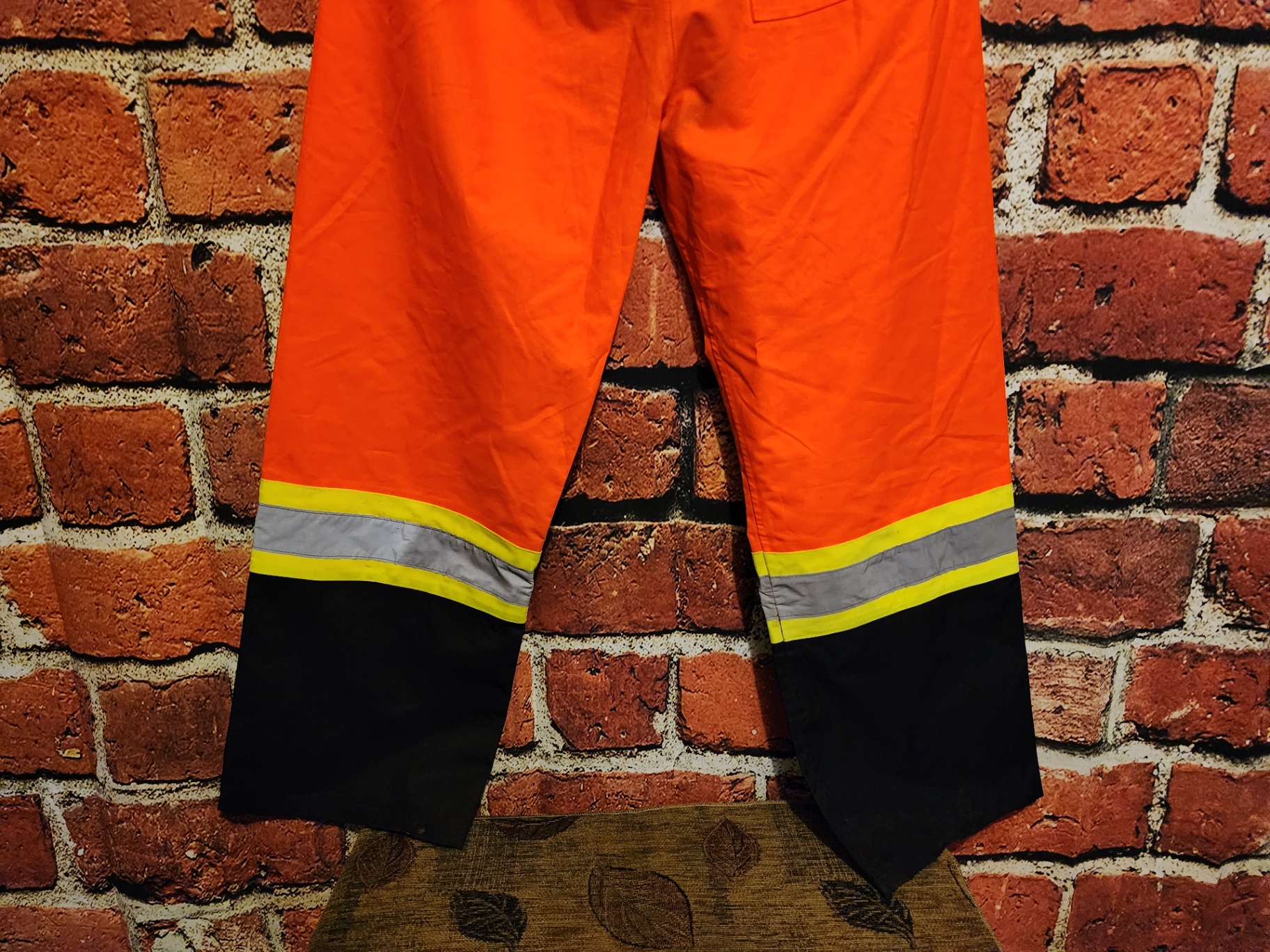 Orange high-visibility safety pants with reflective bands - image 3 of 9