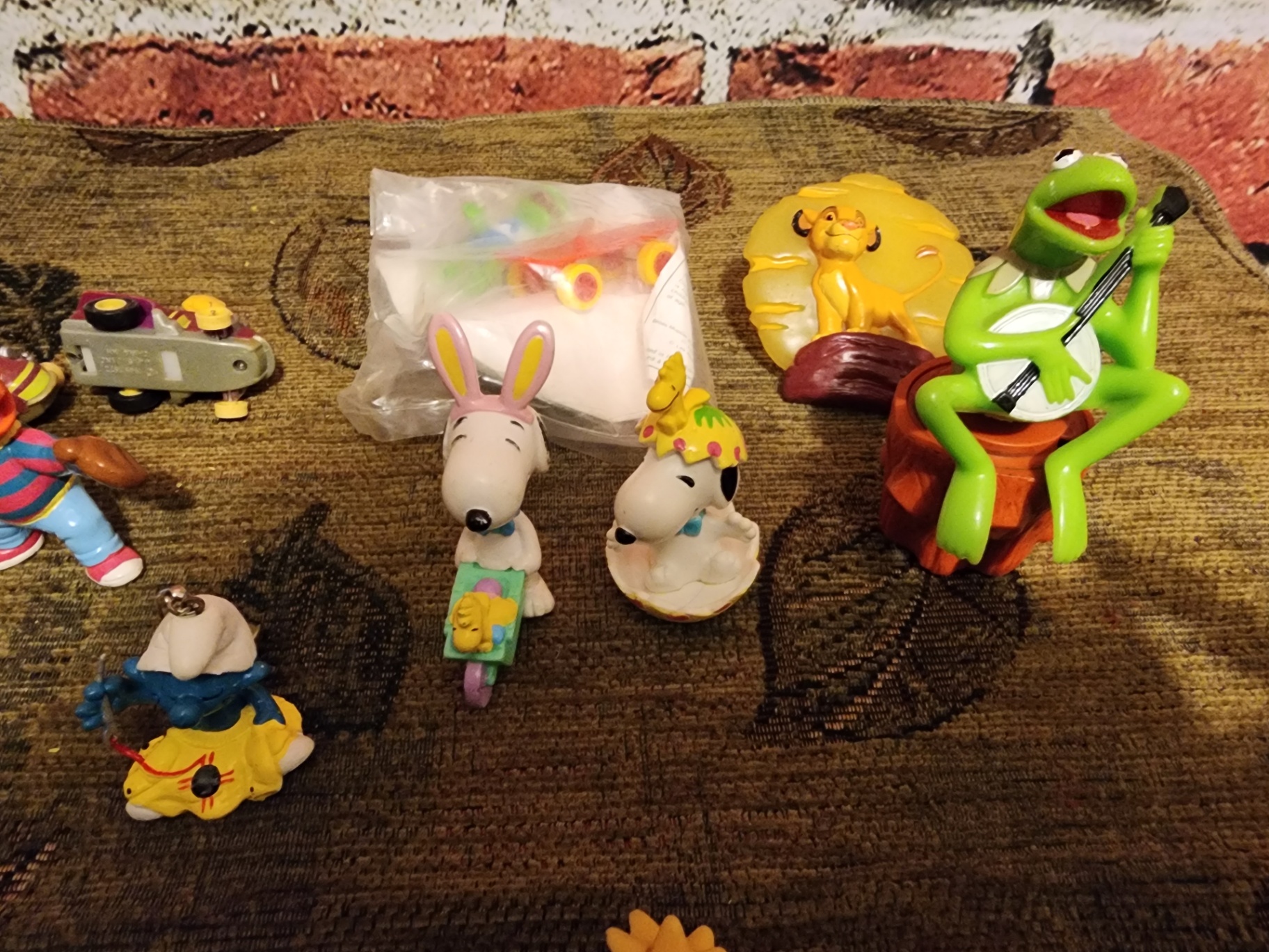 Assorted plastic cartoon character figurines and accessories - image 1 of 12