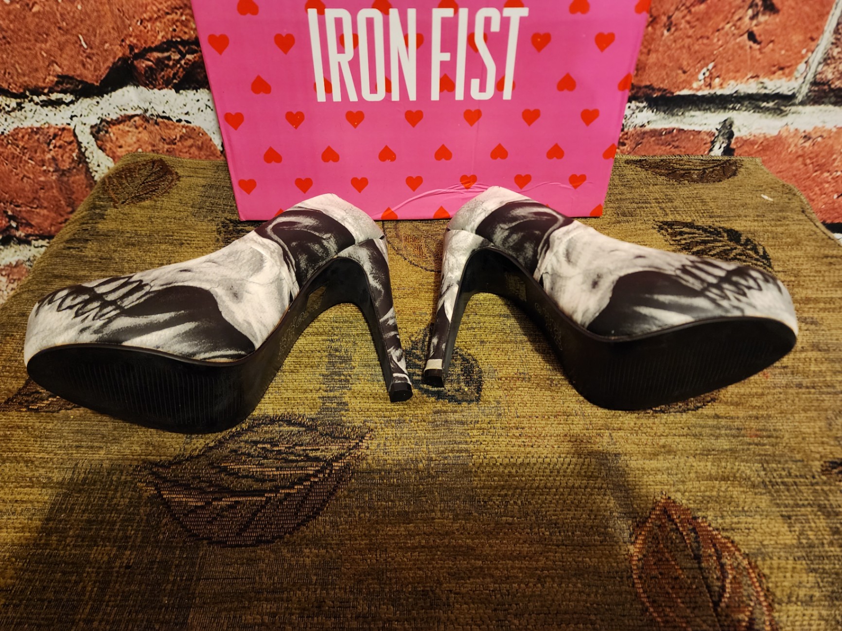 Two pairs of skull-patterned high-heeled shoes with leopard lining - image 2 of 7