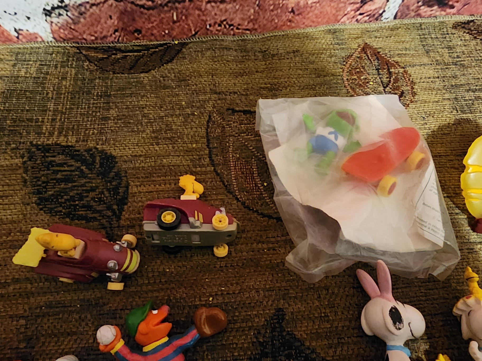 Assorted plastic cartoon character figurines and accessories - image 11 of 12