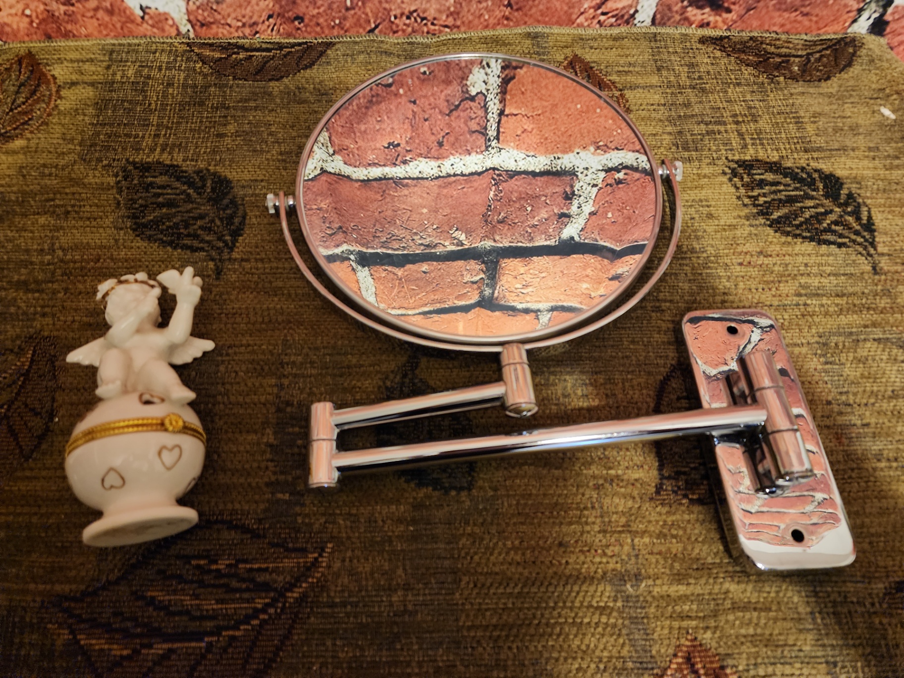 Round vanity mirror with porcelain angel figurine and decorative containers - image 3 of 8
