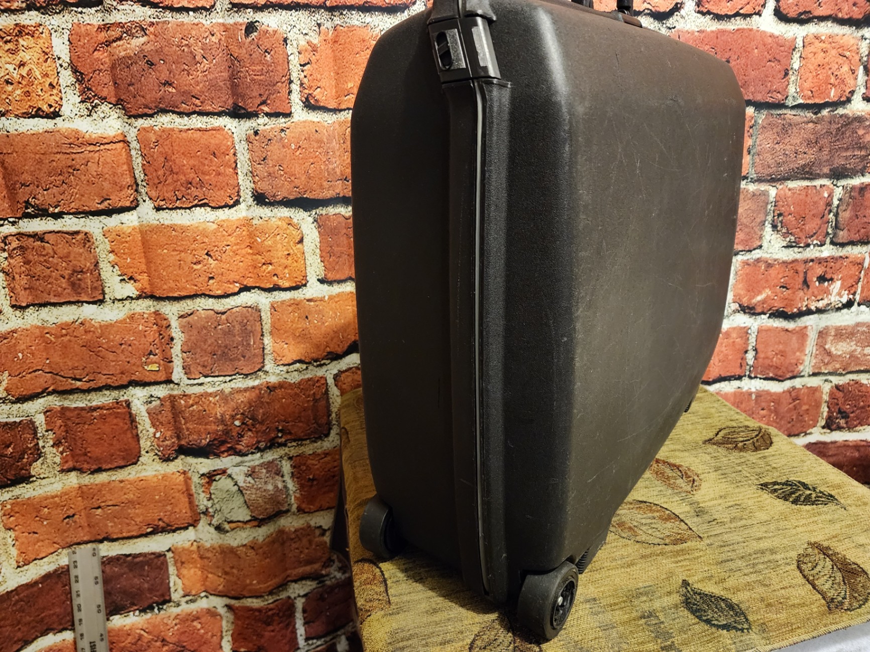Black Samsonite hard-shell wheeled suitcase - image 2 of 11