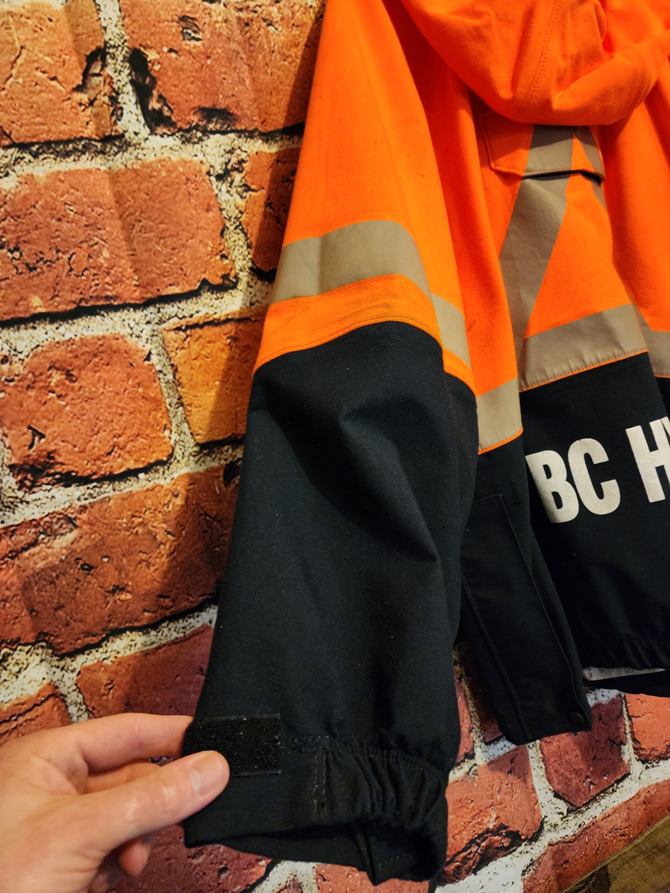 Orange high-visibility safety jacket with reflective stripes - image 7 of 9