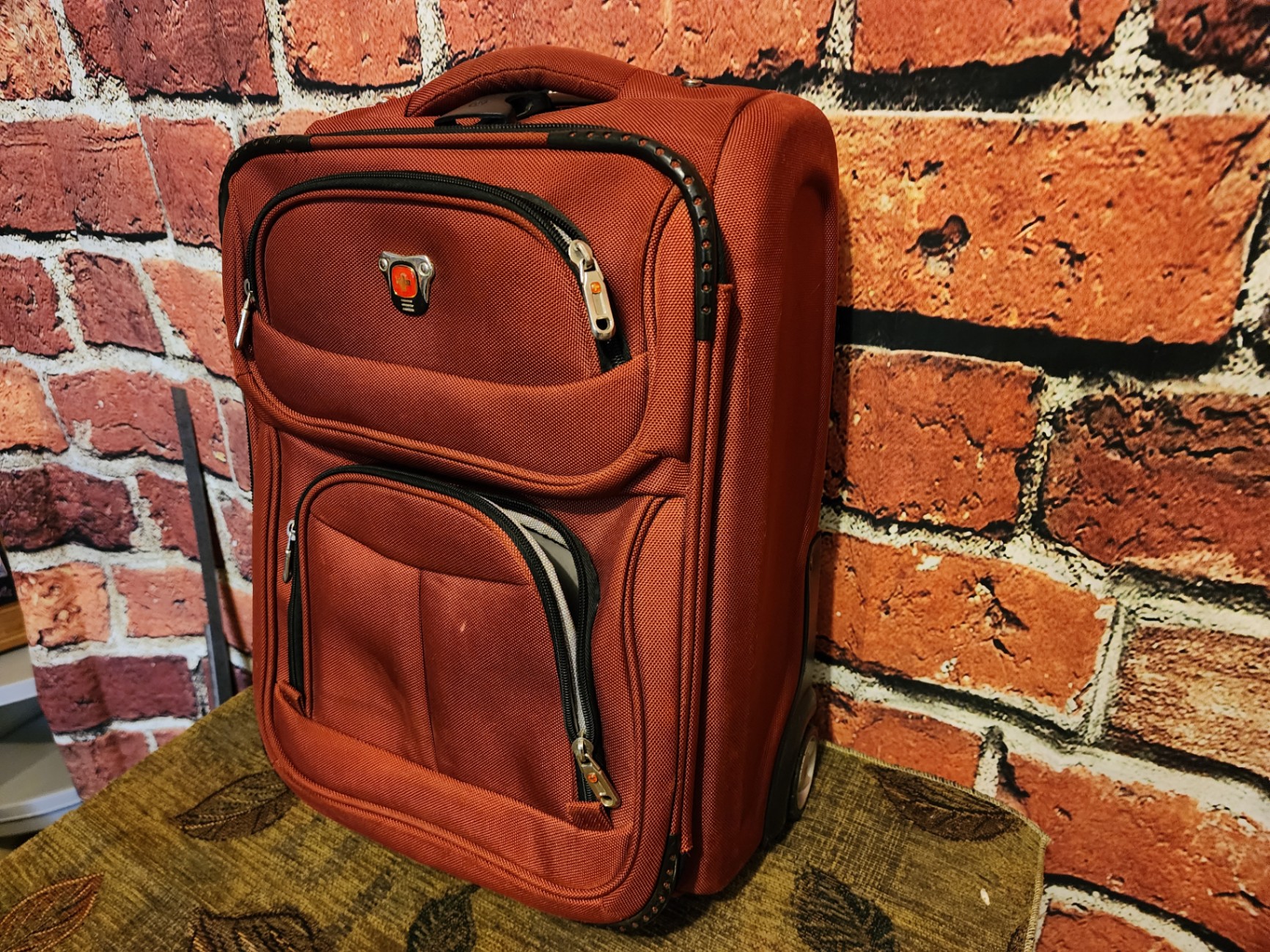 Black wheeled base, gray SwissGear red rolling suitcase - image 7 of 10