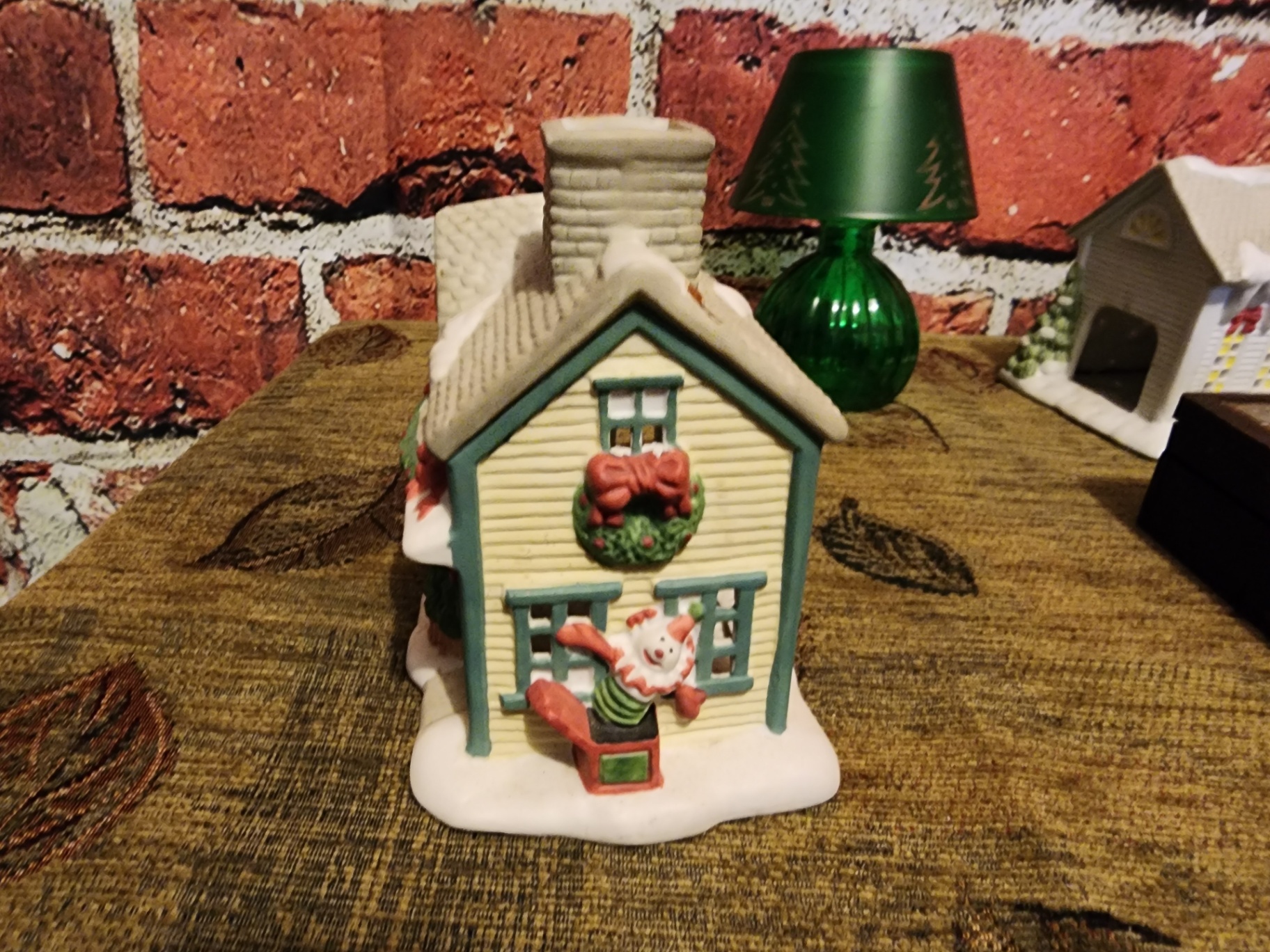 Ceramic Christmas village buildings with green glass lamp - image 4 of 20